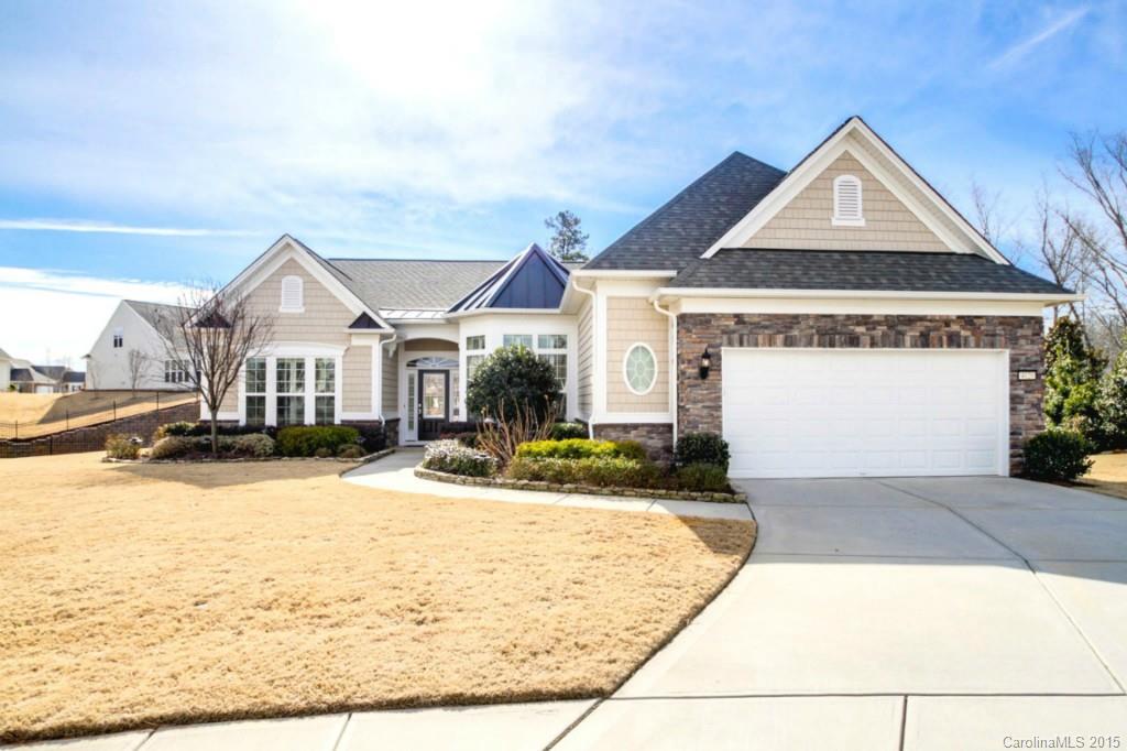 Cream of the crop!  Cumberland Hall (with 4 ft. garage extension) 3BR/2.5BA with office & screen porch sits on a cul-de-sac with spacious woods behind. The interior boasts millwork moldings & panels, plantation shutters, custom granite, extended island, glass panels in cabinets, pullouts, under cabinets lights/dimmers, full wall cabinets in mud room, library built-ins, hardwoods, upgraded Master Bath & much more! Come check out the community and active adult lifestyle of Sun City Carolina Lakes.