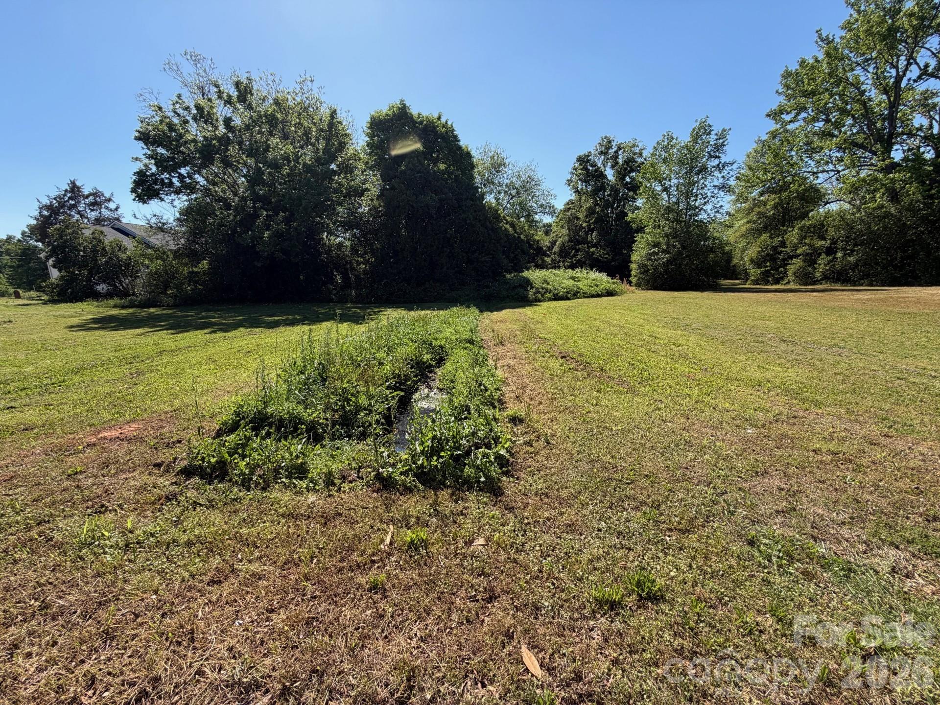 Exceptional opportunity to own a +/- 0.175 acre homesite in a desirable area. This lot offers the ideal canvas to create a custom residence with efficient use of space, perfect for modern living and low-maintenance design.