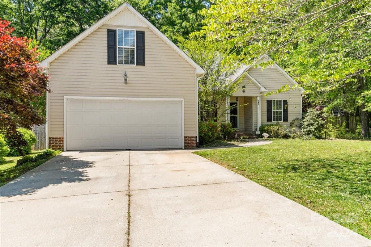 This lovely ranch-style house is situated on a wooded lot within the city limits of York. This house has three bedrooms and two bathrooms, with a split floor plan layout, a dine-in kitchen, a formal dining room, centrally located laundry, a two-car garage, a covered front porch, covered screened back porch in a private backyard. The primary bedroom includes a walk-in closet and en-suite bathroom with a large vanity, and garden tub, with a shower. The roomy living area is flooded with natural light from the large windows, creating a warm and inviting atmosphere. The open floor plan seamlessly connects the living area to the dining room and kitchen, making this living area has everything you need for comfort and style. The kitchen has been updated with granite countertops. The back porch is perfect for relaxing or entertaining guests. Don't overlook this lovely home!

The outdoor dog enclosure doesn’t stay with the property.