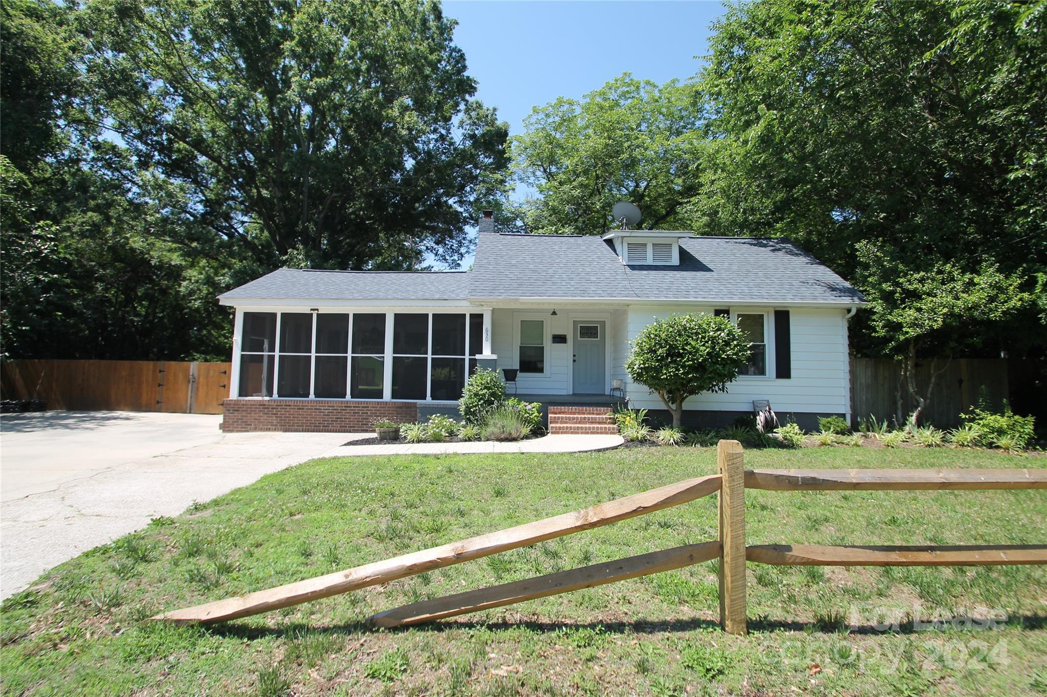 Cute House Located Close to Downtown Rock Hill, SC, 2 Bedrooms, 1 Bathroom, Open Living Concept with Living Room with Fireplace (Non Operational), Dining Area, Kitchen with Large Granite Countertop Island, Gas Range, Refrigerator & Microwave. Laundry Room off of Kitchen with Stackable Washer & Dryer. Screened Side Porch. Large Fenced In Back Yard with plenty of shade. Single Family Only.
No Smoking/No Vaping. Call Owner for All Pet Permission.
Available NOW for viewing by key sign out from our office Monday-Friday from 9am-4pm, except Holidays. Keys to be returned by 5pm same day. Requires $20 refundable deposit.