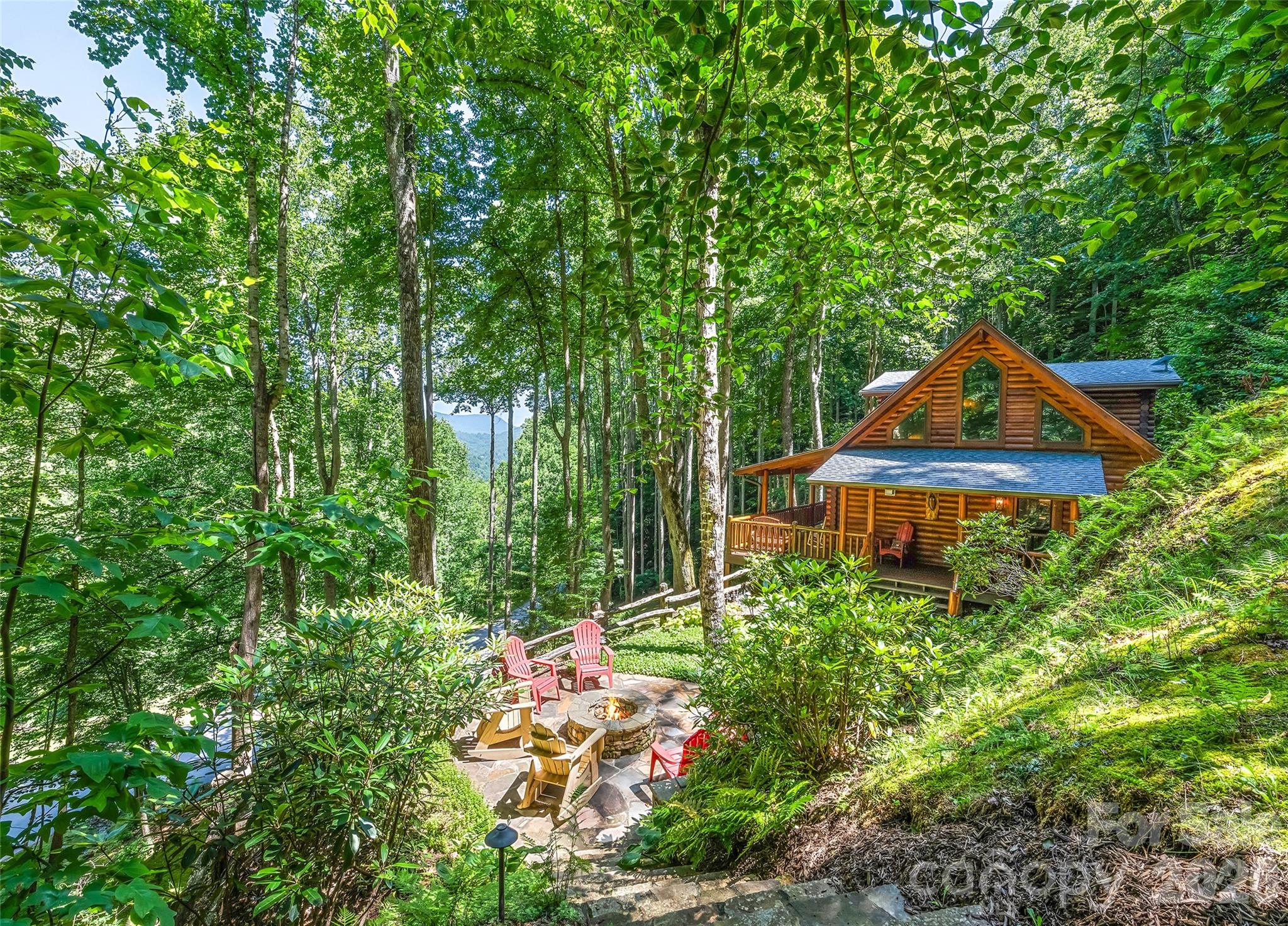 Peaceful and beautiful setting at the gated community of the Smoky Mountain Retreat at Eagle's Nest. This well maintained log home features an open floor plan, vaulted ceilings, wood floors and covered porches. You can enjoy year-round mountain views from the front covered porch or gather around the fire pit to take in the natural surroundings. The property offers easy year-round access. Furniture and accessories are included with some exceptions.