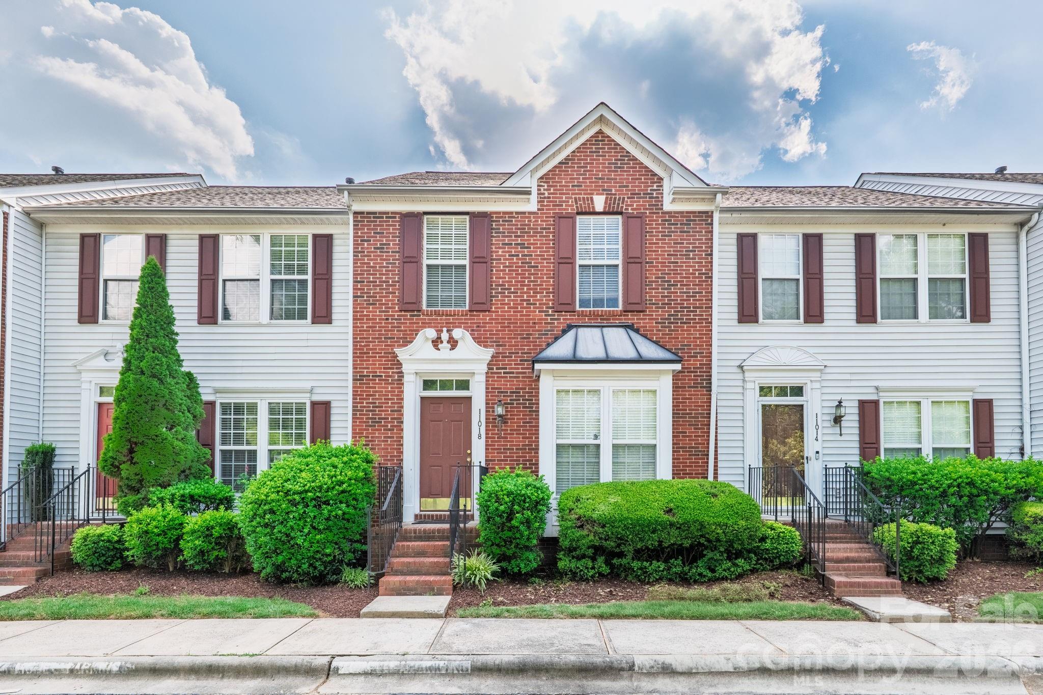 Welcome to this well-maintained 3-bedroom, 3.5-bath townhome offering three levels of versatile living in a low-maintenance community. Freshly painted throughout with freshly cleaned carpet, a roof replaced in 2024, and HVAC replaced in 2019, this home is move-in ready for its next owner. The main level features a spacious living area, a bright kitchen with a dedicated breakfast area, and access to an elevated deck overlooking the private, fenced backyard—perfect for relaxing or entertaining. Upstairs, you'll find the primary suite with a private bath, along with an additional bedroom and full bathroom. The fully finished lower level offers exceptional flexibility with its own bedroom, full bathroom, living area, and laundry room, making it ideal for guests, multi-generational living, a home office, or recreation space. Step outside to the lower patio and enjoy the privacy of the fenced backyard. Conveniently located just minutes from shopping, dining, and I-485, this spacious townhome offers the perfect combination of space, flexibility, and an unbeatable location.