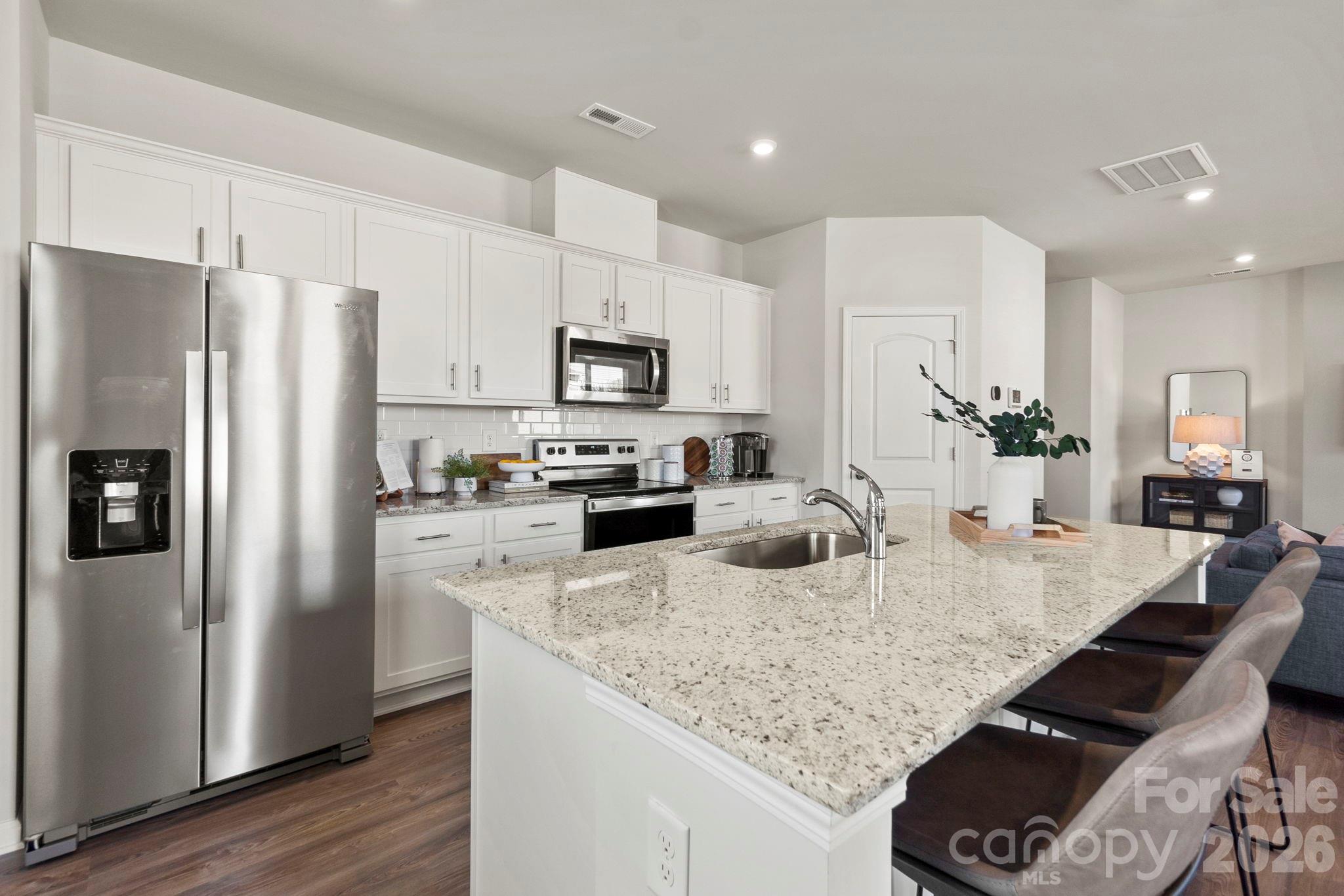 Discover Your Dream Home in Meadow Creek Village! You’ll fall in love with the Kephart, a versatile open-concept plan offering two stories of inviting living space and stylish features. As you enter the home from the ample front porch, a long foyer leads to a wide-open great room, a well-appointed kitchen with a spacious center island and Quartz countertops and a charming dining area with direct access to the patio. As you head upstairs, you’ll find two generous secondary bedrooms—sharing a full hall bathroom—plus a convenient laundry room. Highlighting the upper level is the private owner’s suite—boasting a roomy walk-in closet and a deluxe bath with dual vanities and a walk-in shower.