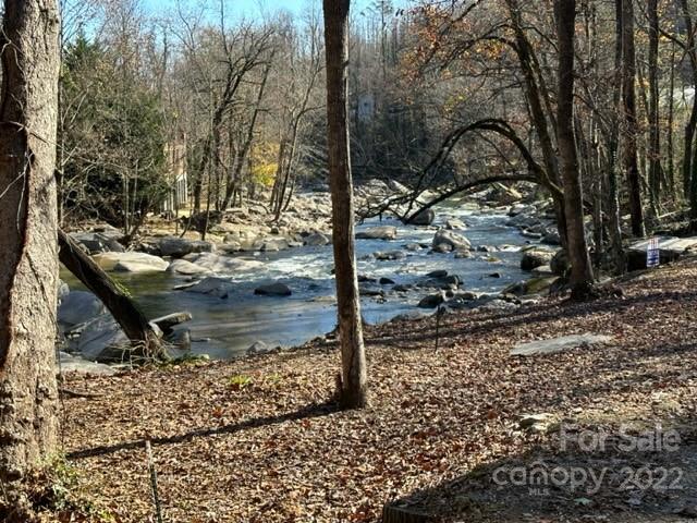 RIVERFRONT 239 ft on the Rocky Broad River.....incredible opportunity to live and enjoy this riverfront location, Build your dream-mountain home. Step out the back for trout fishing or just take in all the pristine beauty and the calming sounds of this bold rushing river, crashing over the massive boulders. This .68 acre offers city water and sewer hookup, all with in the gated Falls at Chimney Rock Development. Listed for $263,000. (must schedule appointments for access through gate)