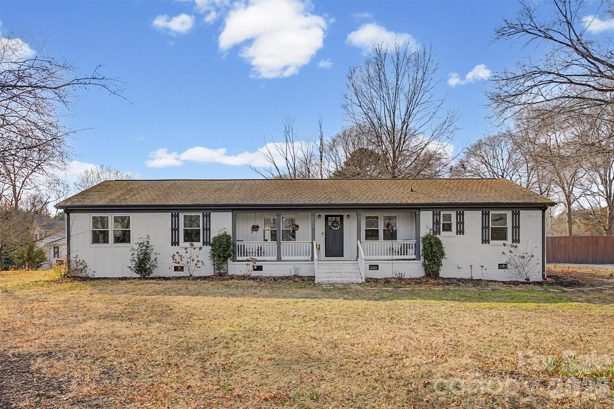 Beautifully updated ranch on a spacious 1-acre lot! This move-in ready home features an open floor plan with Beachwood LVP flooring throughout the main living areas. The kitchen shines with white shaker cabinetry, built-in pantry, granite countertops, designer backsplash, stainless steel appliances, large breakfast bar, and generous dining area. The oversized great room is anchored by a cozy fireplace (June 2024). Desirable split-bedroom layout includes two primary bedroom suites—ideal for multi-generational living or guests. The main suite offers dual walk-in closets and a custom walk-in shower with rainfall shower head (Aug 2024), while the second suite features a walk-in closet and updated bath with dual granite vanity and tiled shower. Enjoy the large front yard and fenced backyard with mature trees plus a storage shed for added storage.