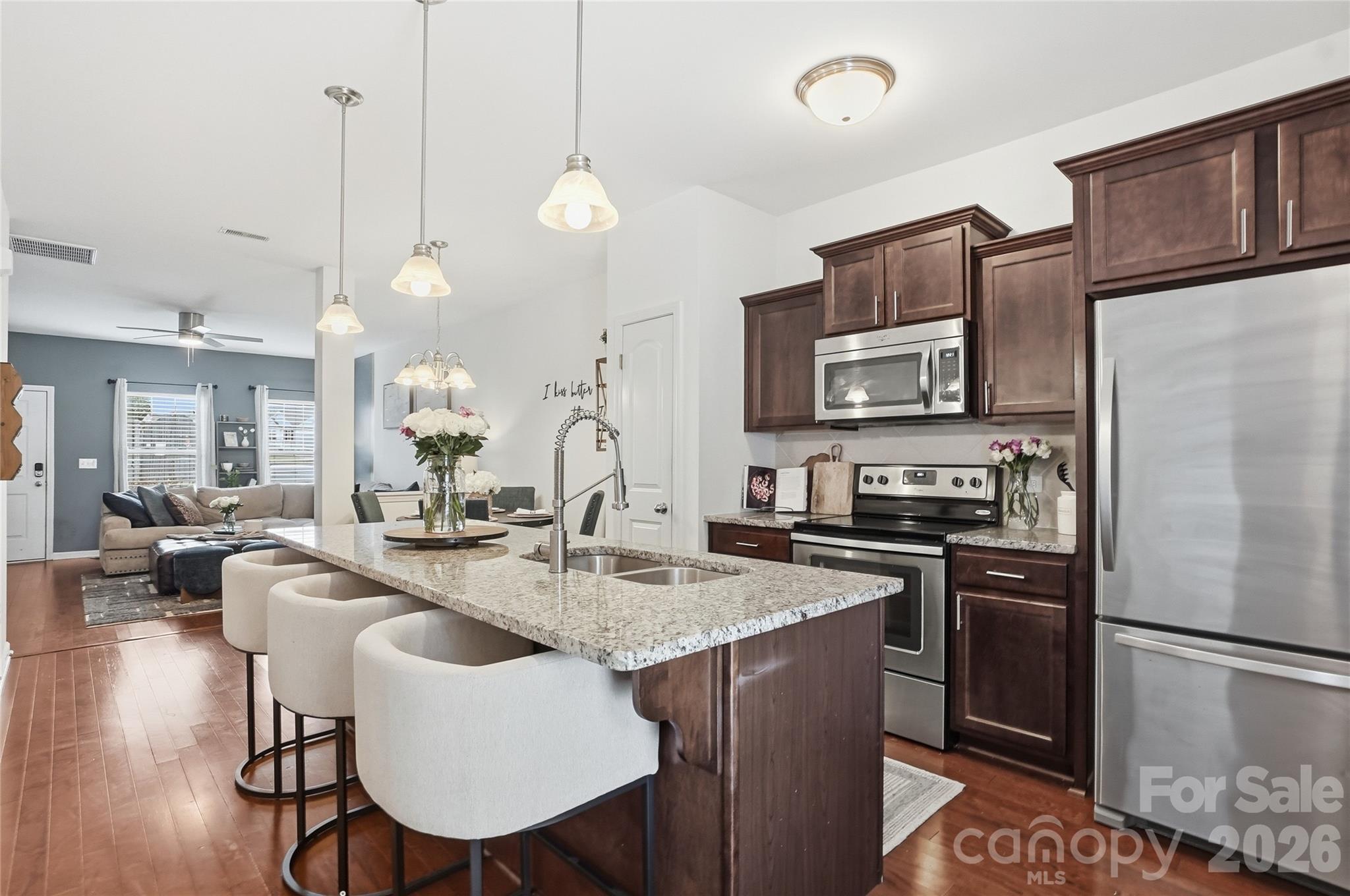 Located in the Steele Creek area, this 2 bedroom, 2.5 bath townhome offers the convenience and low maintenance lifestyle that make townhome living so appealing. Well maintained by its original owner, this home reflects the care and attention that comes with owner occupancy. 

The main level features an open layout that brings together the living, dining, and kitchen areas, creating a welcoming space where people naturally gather. Upstairs, both bedrooms have their own private bath, offering flexibility for guests, roommates, or a home office setup. A convenient half bath on the main level is perfect for visitors.

Step outside to the covered back patio and fenced yard, creating a comfortable outdoor space that's ready for everything from morning coffee to weekend cookouts, playtime with pets, or simply unwinding after a long day. Just off the patio, you'll also find a storage closet that's perfect for keeping outdoor gear, seasonal décor, and other extras tucked away.

You'll be just minutes from Rivergate, Charlotte Premium Outlets, dining, grocery stores, McDowell Nature Preserve, I-485, I-77, Uptown Charlotte, and Charlotte Douglas International Airport. 

HOA dues include water, sewer, and trash, helping keep monthly expenses simple. The seller is also providing a one year home warranty for added peace of mind. 

If you've been looking for a well-maintained home in a convenient location with outdoor space and easy access to shopping, dining, recreation, and major commuter routes, this one deserves a place at the top of your list.