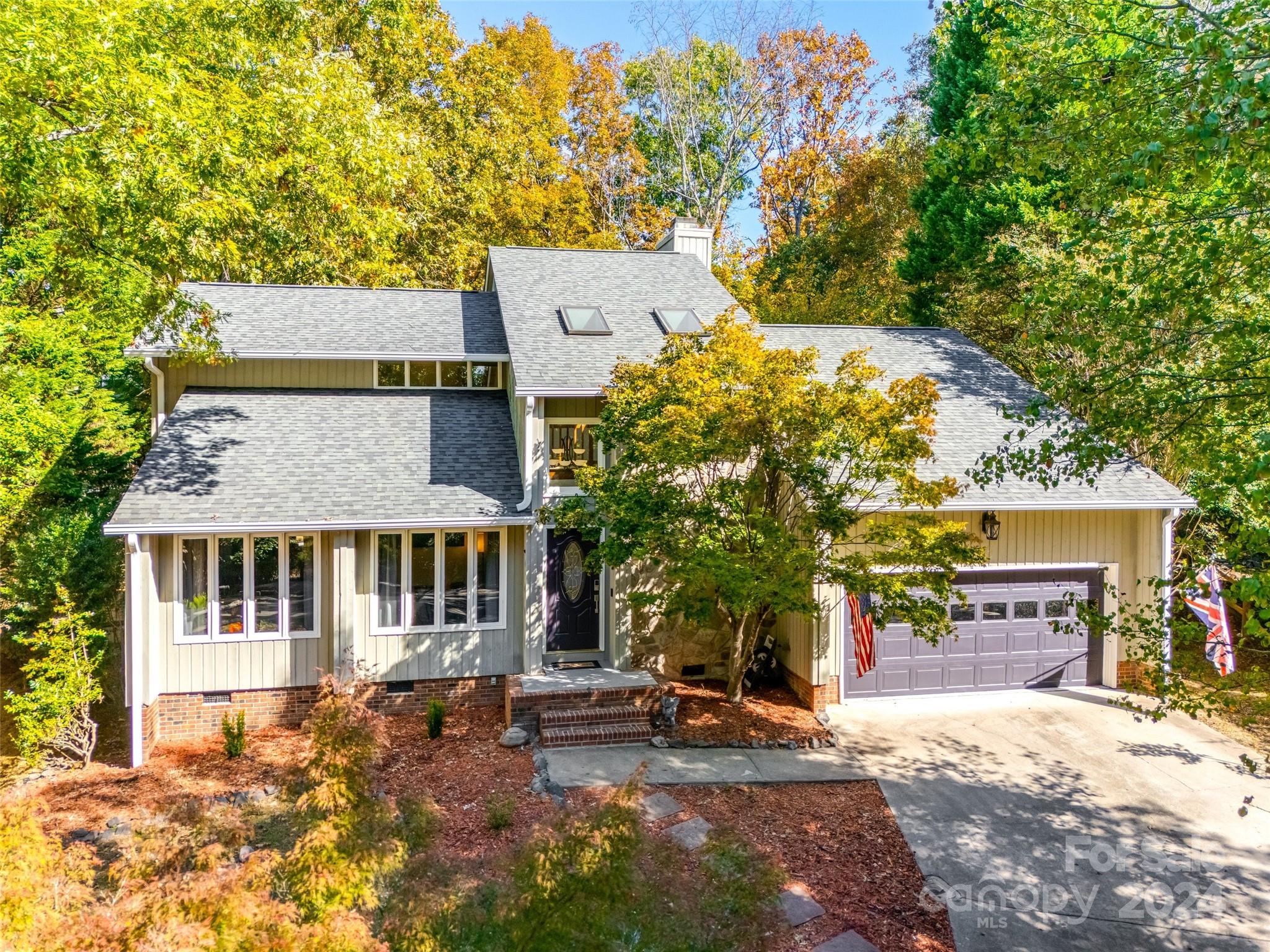 Fully renovated home in coveted Tega Cay within walking distance of the clubhouse, Shore Club restaurant, golf course, pickleball courts, tennis courts and more! New roof and gutters in 2022, new encapsulated crawlspace with dehumidifier in 2024 and HVAC replaced in 2022. New rear sliding glass door. New larger water heater. New light fixtures and ceiling fans throughout. Primary bathroom completely remodeled with custom tile shower and dual sink vanity. Hall bath and powder room both recently remodeled. Kitchen updated with white cabinets, granite countertops, tile backsplash and stainless appliances plus island with seating. Engineered wood floors throughout main level and brand new carpet upstairs. Fresh neutral paint throughout. Covered rear porch with composite decking overlooks spacious, flat, wooded and fenced backyard! Oversized 2 car garage with bonus walk in storage area. Desirable cul-de-sac location. This is a hard to find gem in the beloved “historic” area of Tega Cay!