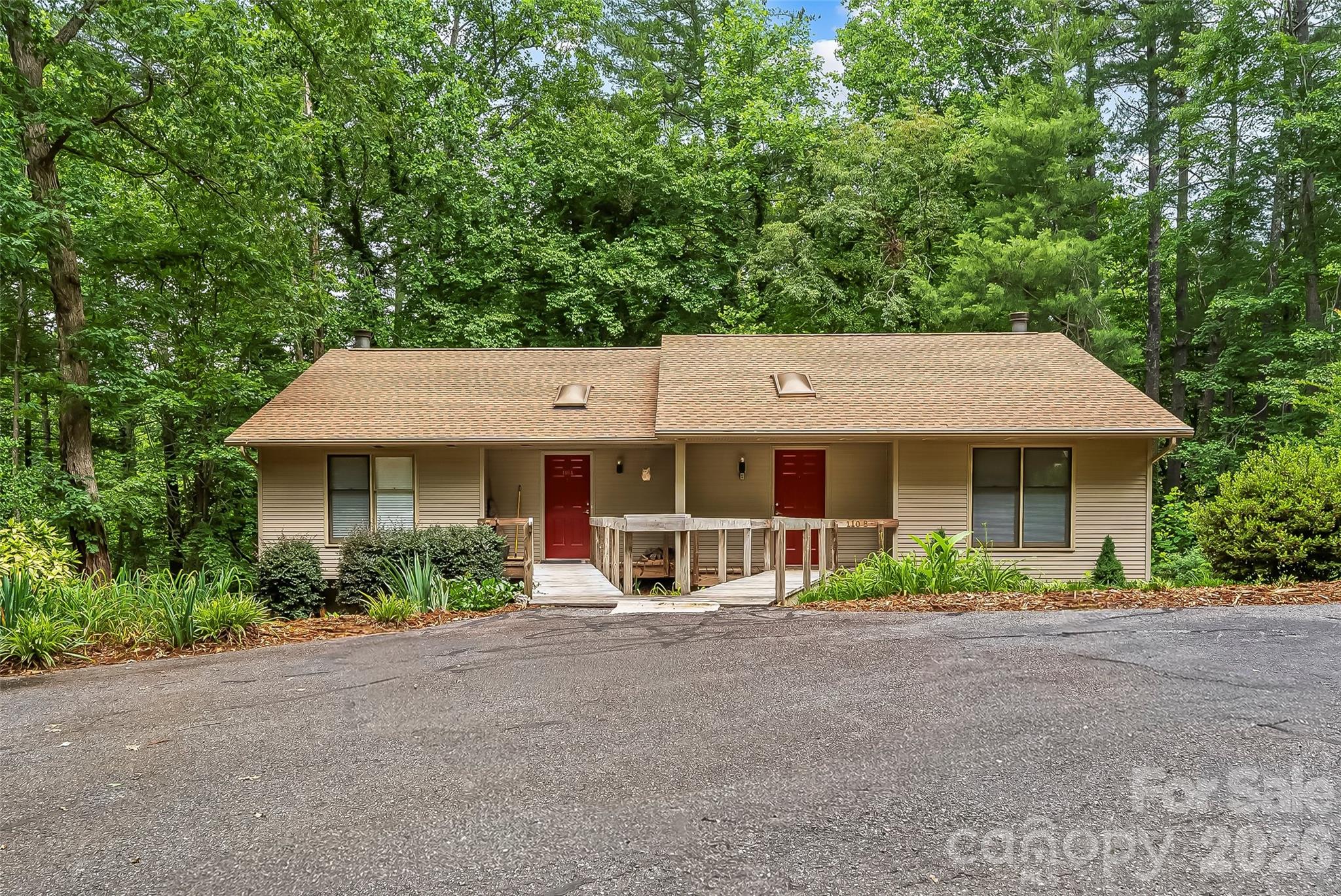 Tucked into a peaceful wooded in-town setting, this beautifully updated townhome offers the perfect blend of comfort, convenience, and low-maintenance living. Featuring 3 bedrooms plus a versatile flex room that can serve as a 4th bedroom, home office, this home provides plenty of room to fit your lifestyle. Recent updates include new appliances, updated flooring, fresh interior paint, and a newer roof, giving you peace of mind and move-in-ready appeal. The spacious layout offers comfortable living areas and flexibility for both everyday living and entertaining. Enjoy the outdoors from both the upper-level deck and lower-level porch/patio area, creating multiple spaces to relax and take in the surrounding natural setting. Conveniently located near shopping, dining, and all that downtown has to offer, this home combines modern updates with a desirable location.