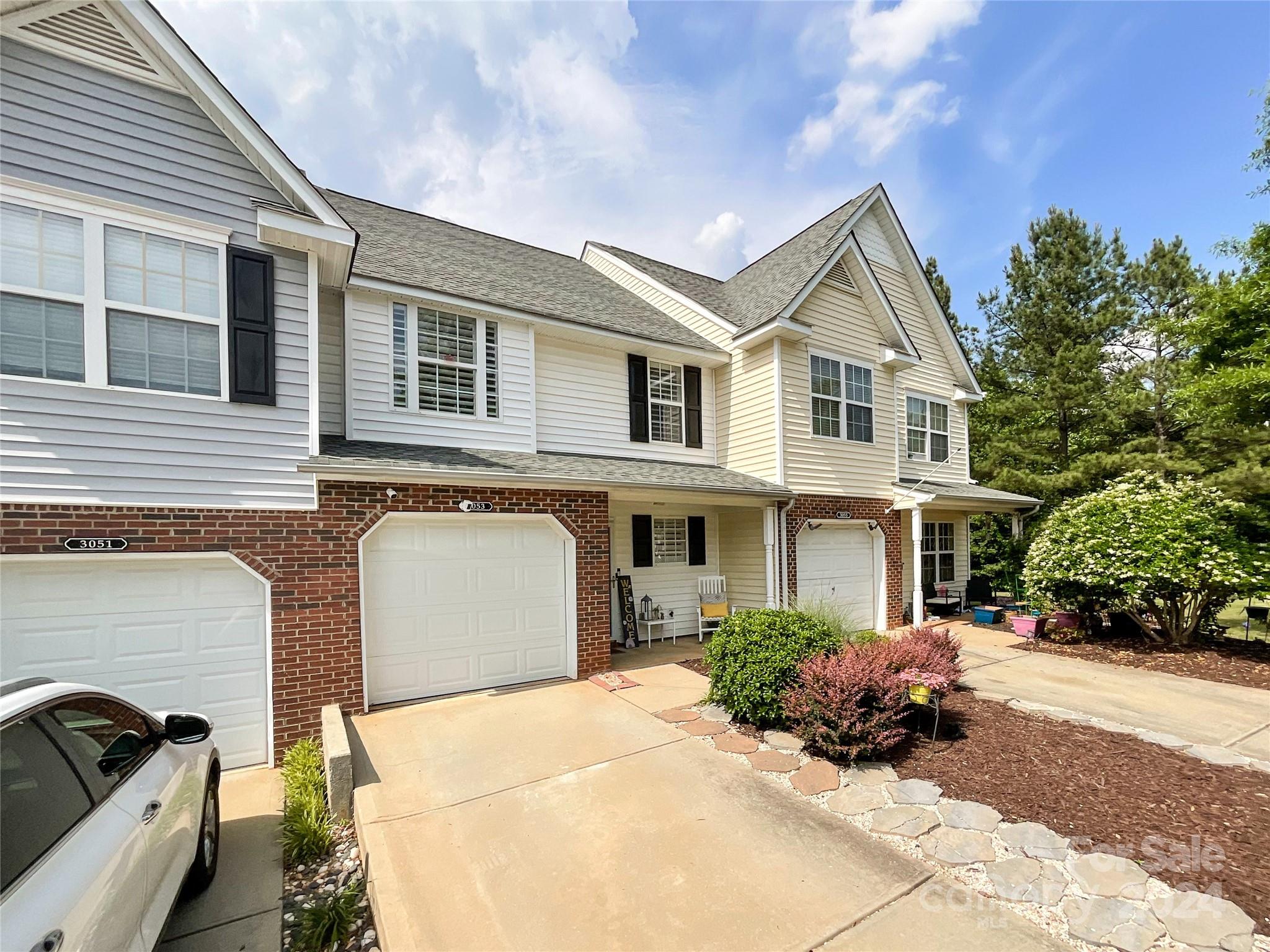 Welcome to this exquisite townhome nestled in the highly sought-after Hanover Crossing neighborhood. The home offers an open floor plan w/ natural light, creating a spacious & welcoming atmosphere. The kitchen is thoughtfully designed with granite countertops, stainless steel appliances and abundant cabinet & storage spaces. Upstairs, the primary suite has a vaulted ceiling, a walk-in closet, and en-suite bathroom that features a large shower/tub combo with built-in shelves  One Car Garage. Original Owner. Community offers Great Pool, Playground, Covered Picnic Area and lawn maintenance which is taken care of by the HOA. Minutes from Ballantyne, Fort Mill, Redstone Theatre and Restaurants. Across the Street will be Costco, Target, Restaurants, and New Retail being built.