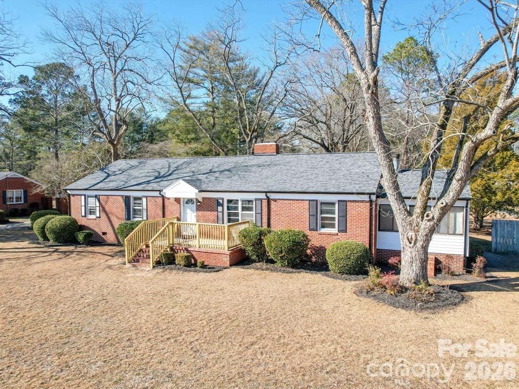 Nestled in the heart of historic Cheraw, SC, this unique property offers two charming properties, presenting a truly exceptional opportunity. The main residence, a delightful 3-bedroom, 2-bathroom home, has been thoughtfully updated with modern comforts while retaining its classic appeal. The kitchen and bathrooms have been tastefully renovated. This inviting space provides a comfortable and spacious layout perfect for families or individuals. Beyond the main house the second dwelling, a 2-bed & 1-bath guest house, exudes Southern charm. The guest house offers a unique opportunity to embrace the true essence of Southern hospitality. Together, these two homes on a single lot create a truly special offering. Imagine enjoying the spaciousness and updates of the main house, while also having a separate, charming retreat for guests or family. The combined properties provide flexibility and potential that is rarely found. Don't miss this rare opportunity to own a piece of Cheraw's charm.