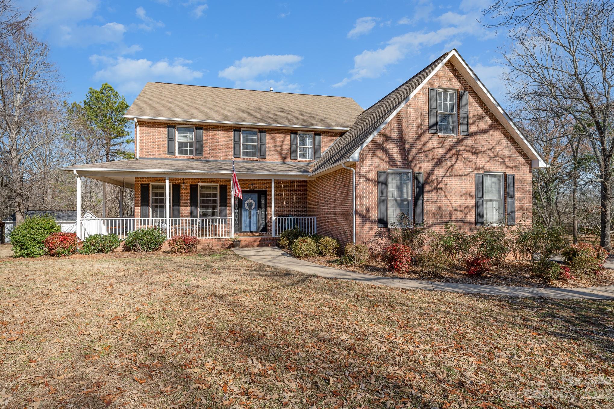 This beautiful, established neighborhood is highly sought-after for its charm and
desirability. With its well-maintained homes and picturesque surroundings, it exudes a
timeless appeal. The home is adorned with a charming wrap-around porch providing an ideal spot
for soaking in the scenic surroundings and enjoying quiet evenings. Home has been updated with new carpet and fresh paint. The large deck presents a perfect vantage point overlooking the fenced-in backyard, creating an inviting space for outdoor relaxation and entertainment. This home features a spacious private bonus room, which can be utilized for various purposes, and a cozy office space that provides a comfortable environment for working from home. The shed at the rear of the property has ample storage and also has space for a small boat or riding lawnmower.  Enjoy the convenience of an easy commute to Charlotte,
with the residence located just off of I-77.