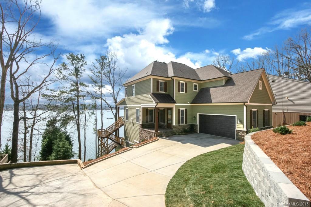 Living on Lake Wylie in a new custom design w/All new construction warranties in place. 3 levels w/big water views; all bedrms, 1st floor kitchen & living , large deck, walk-out basement & covered patio. Beautifully appointed kitchen, walk-in pantry, 6 burner gas cooktop, SS appliances.  Luxurious master bath w/ tub and large custom tiled shower. Daylight bsmnt has finished full bath, framed 4th bed & lg rec room, high clg. Dock permit in place.  IN SEARCH OF EXCELLENCE? This is it. Rent option.