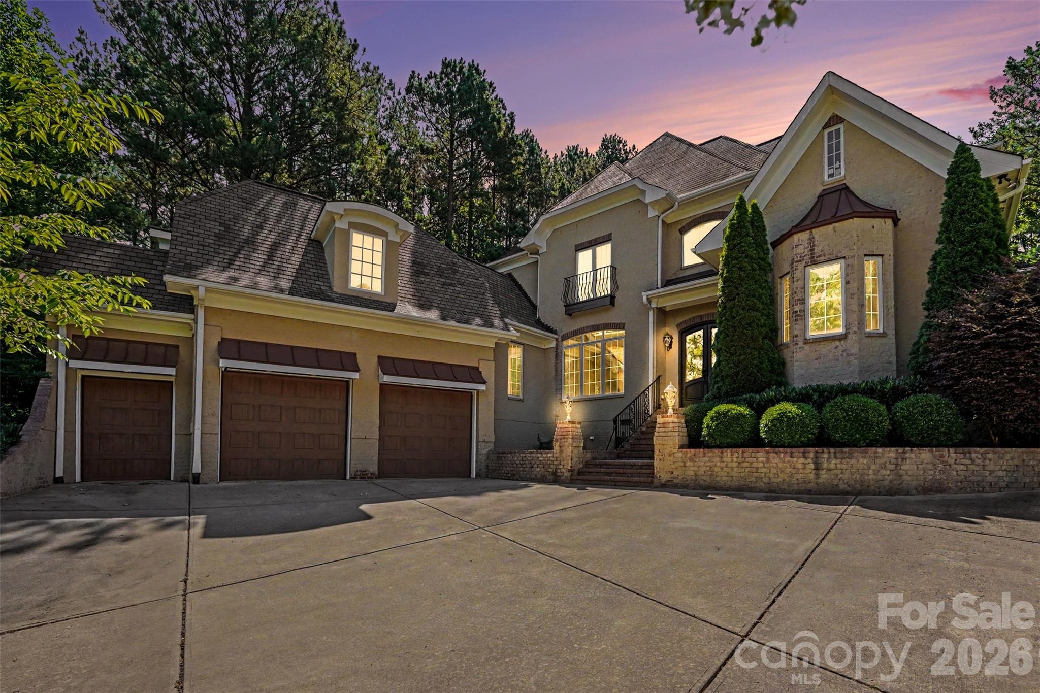 Beautiful, spacious custom home in Belmont’s premier gated community, Reflection Pointe, just steps from Lake Wylie and neighborhood amenities. All-brick transitional design with 5 bedrooms, 3.5 baths and approximately 4,347 square feet HLA gives you the space you’ve been looking for, plus a lush half-acre private lot. Inside, you’ll love the warm hardwood floors, gracious 2-story layout, inviting great room with fireplace, and a true entertainer’s kitchen featuring Bosch appliances including double ovens and a warming drawer, gas cooktop, generous granite island.

The main-level layout is designed for comfort and convenience with a spacious primary retreat offering a soaking tub, walk-in closet, and easy access to the laundry room on the same level. Upstairs you’ll find additional bedrooms and baths, giving everyone their own space along with flexible options for a bonus room, home office, or media room. Thoughtful details continue throughout the home with insulated windows, tankless gas water heater, in-ground irrigation, and an oversized attached garage plus golf cart bay and keypad entry.

Step outside to a covered porch/lanai that extends your living space outdoors and overlooks the landscaped backyard that gently leads to a community walking trail, serene pond, and fountain. From sunrise walks to sunset strolls, you’re perfectly positioned to enjoy the natural beauty that makes Reflection Pointe so special.

Living here feels like vacation every day: enjoy the clubhouse, pool, lighted tennis courts, playground, recreation areas, 22 ponds with working fountains throughout the community and community beach right on Lake Wylie, plus boat/trailer storage included in the HOA fee. Only 25 miles to Mountain Island Lake for lake boating. Spend evenings at the community pavilion by the marina, relax on the sandy beach, and watch the sunset over the main channel of Lake Wylie. All of this in the  sought-after Belmont location with highly rated Belmont Central Elementary and easy access to shopping, dining, and historic downtown Belmont. Great backyard level and ready for a pool install! Great access to the Douglas Airport, the White Water Center and Downtown Charlotte! Great place to be!

* Please note some images are digitally staged, there is no existing swimming pool.