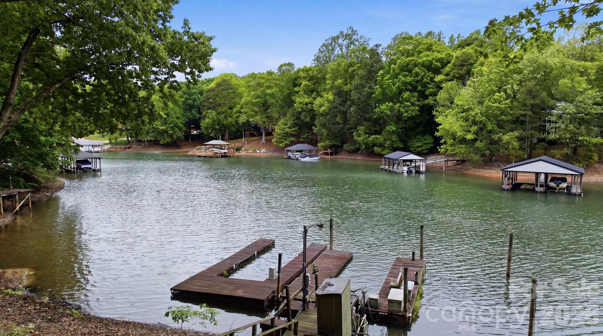 **Waterfront Living on Lake Norman | 142 Seekirk Road, Troutman**

Discover the perfect blend of luxury, tranquility, and waterfront living at **142 Seekirk Road**. Set along the shores of Lake Norman, this exceptional property offers the lifestyle so many dream of—where every day begins with sparkling water views and ends with unforgettable sunsets.

The dock provides deep-water year-round access and privacy of a beautiful tranquil cove view.

Enjoy the unmatched Lake Norman lifestyle, 142 Seekirk Road is one you won't want to miss.

Home is currently not habitable as is.