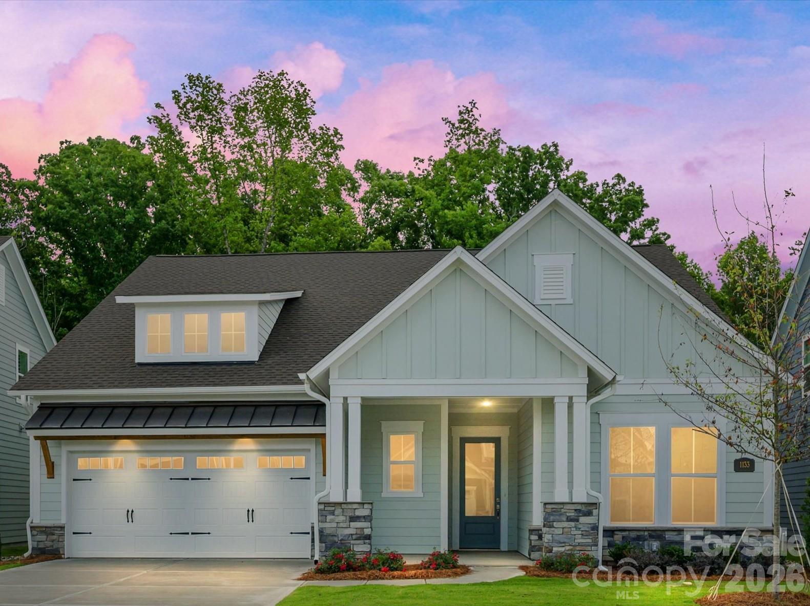 Location, location, location!  Move into your NEW ranch home in a beautifully located Waxhaw community…minutes to shopping, restaurants, parks, medical and more!  Top-quality craftsmanship and refined luxuries combine to make this 55+ living at its best. Open family, dining and sitting areas offer versatility. Relax in your cozy and sunny sitting area or in front of your family room fireplace!  The gourmet kitchen island and open dining area offer multiple mealtime settings and stylish tile frames the stainless canopy hood to the ceiling.  Your spacious owner’s retreat is private.  French doors are the finishing touch for your study.   Stay organized with the convenience of extra room in your garage.   RARE OPPORTUNITY ADJACENT TO CONSERVATION AREAS.  Visit us today!