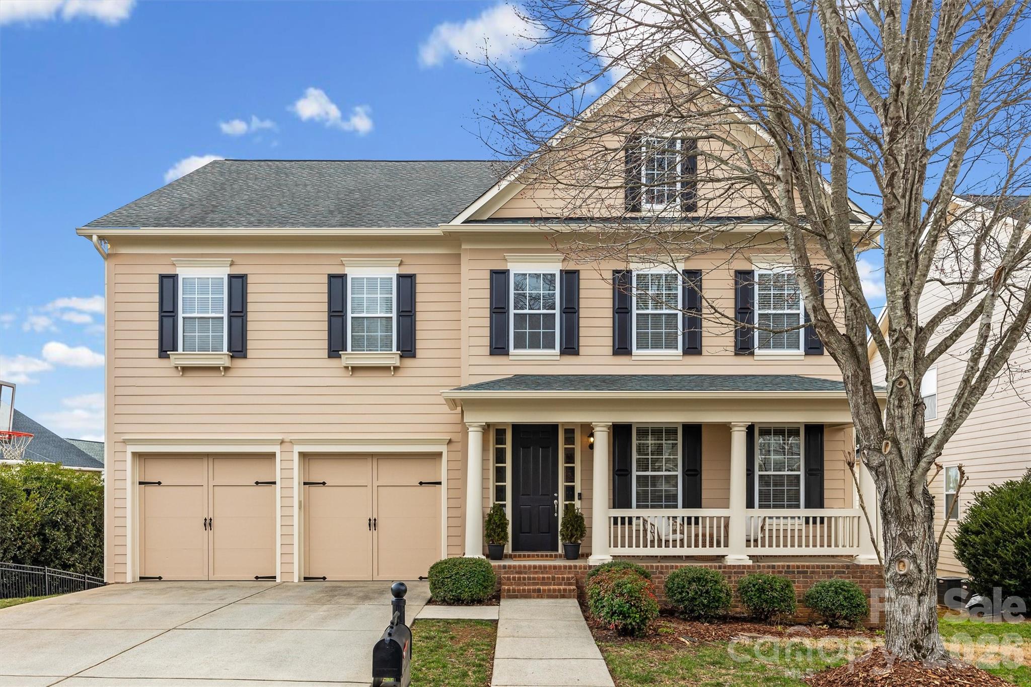 Spring is here—and there’s no better time to find your place in Bridgemill, one of Indian Land’s most sought-after communities.
Tucked away on a quiet side street leading into a peaceful cul-de-sac, this stunning two-story basement home by John Wieland offers the perfect blend of space, comfort, and versatility. From the moment you arrive, the freshly painted exterior and charming front porch invite you to slow down and stay awhile—morning coffee has never looked better.
Step inside to a bright, two-story foyer, a private first-floor office, and a thoughtfully designed layout that flows effortlessly for both everyday living and entertaining. Expansive windows flood the home with natural light, creating a warm and welcoming atmosphere throughout. 
Upstairs, the spacious primary suite offers dual closets and separate tub and shower. A generous loft offers flexible living space, while three additional bedrooms—each with convenient bathroom access—provide comfort and privacy for family or guests.
Out back, enjoy a large deck perfect for grilling, gathering, or unwinding at the end of the day. The backyard is a blank canvas ready for your vision—whether it’s a pool, firepit, paver patio, or your dream outdoor entertaining space—all easily accessible from the walk-out basement.
And just wait until you see the basement 
This expansive lower level is a true extension of the home, offering incredible flexibility with a full bathroom, two flex areas, a spacious entertainment zone, and a dedicated media room. Whether you’re dreaming of a home theater, gym, guest suite, or multi-generational living setup, this space delivers—with convenient walk-out access to the backyard.
Living in Bridgemill means enjoying resort-style amenities including a clubhouse, two pools, pickleball courts, pocket parks, scenic pond, and walkable access to shopping and dining at Bridgemill Commons right at the entrance.
The refrigerator, washer, and dryer will remain with the home. Recent updates include: a freshly painted exterior, LVT in 2 upstairs guest bathrooms and laundry room, rear deck freshly painted, roof ( 2019).
The current seller is not the original owner. The basement was completed by the previous owner. While the work appears to have been professionally done, no permits for the basement improvements were obtained, that I have found.