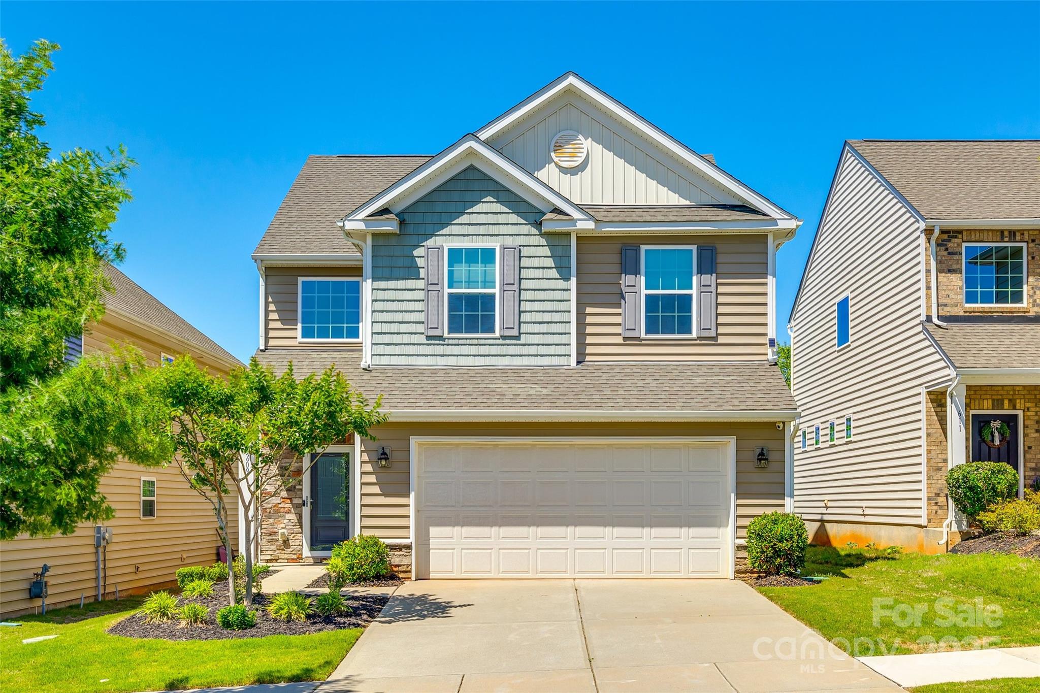 Welcome Home! Don't miss your opportunity to live in this beautiful 4 bedroom, 2.5 bathroom home in the well desired neighborhood of Waterside at the Catawba located in the award-winning Fort Mill School District. This open concept floorplan has hardwood floors on the first floor, fresh paint, gourmet kitchen equipped with quartz countertops, stainless steel appliances, new light fixtures and plenty of cabinet space. Upstairs you'll find all new carpet throughout, a loft, perfect for a playroom or office, laundry, all 4 bedrooms including the large primary suite with walk in closet and primary bath equipped with double vanity sink and garden tub. Enjoy the large fenced in yard and all the amazing amenities this neighborhood to offer including a beautiful clubhouse, fitness center, large outdoor pool, tennis courts, walking trails, Banks Athletic Park which has softball fields, basketball court and playground. Don't miss your opportunity!