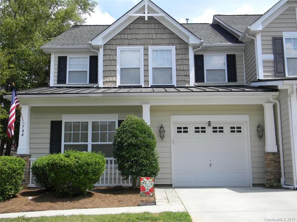 Come home to this amazing townhome. Lovely end unit with a screened porch & paved patio.  One of a kind open floor plan. Great room with vaulted ceiling & gas log fireplace. Formal dining. Kitchen has all the bells & whistles. Stainless Steel dishwasher, stove & microwave, granite countertops & lots of cabinets. Master on main with trey ceiling, hardwoods & walk-in closet. Master bath has double sinks, soaking tub & separate shower. Upstairs has a loft/study & 2 large bedrooms. TONS of storage.