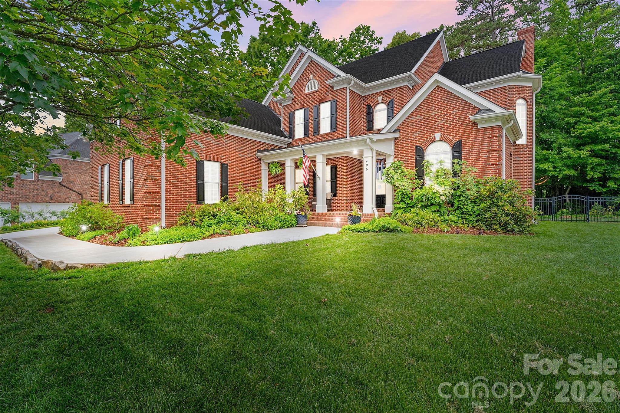 Set in the award-winning WEDDINGTON SCHOOL DISTRICT, this exceptional full-brick Shea-built estate is located in the coveted Blackstone community of Wesley Chapel. Positioned on a breathtaking, tree-lined lot just shy of an acre, the home showcases timeless architecture, custom craftsmanship, and luxury living throughout. Interior highlights include, dual staircases, soaring vaulted ceilings, curved archways, transom windows, plantation shutters, detailed molding, and abundant natural light. Refinished hardwood flooring spans the main living areas and is complemented by new carpeting, fresh paint, and upscale lighting, creating a cohesive, elevated feel throughout.

Designed for both entertaining and everyday living, the heart of the home is the fully renovated custom kitchen completed in 2019. Featuring custom soft-close cabinetry with pull-out organization, an expansive quartzite island with storage, quartzite countertops, herringbone subway tile backsplash, Dacor dual fuel gas 6- burner range and electric double oven, and full-size built-in refrigerator and freezer.  

This thoughtfully designed floorplan keeps functionality in mind, offering plenty of space for everyone to gather, work, and unwind. The open-plan living room is anchored by a striking brick wood-burning fireplace and a dramatic wall of windows overlooking the peaceful backyard.  A front music room offers flexibility for a home office, sitting room, or library, while the formal dining room is complemented by a beautifully updated butler’s pantry with quartzite countertops. 

The luxurious primary suite feels like a private retreat with a completely renovated spa-inspired bathroom featuring heated floors, a stone resin soaking tub, tiled walk-in shower with 3 separately controlled shower heads, dual sink vanity, LED mirrors with touch controls, and added skylights that flood the space with natural light. Custom built-ins complete the spacious primary closet. Upstairs, each spare bedroom offers ensuite bath access, including two beautifully remodeled bathrooms with intricate tilework, updated vanities, LED mirrors with touch controls, and upscale finishes throughout. Don't miss the large bonus room which offers additional flex living space.

Outdoor living is equally impressive with an expansive covered porch addition featuring a wood-burning fireplace, creating the perfect year-round entertaining space. A separate paver patio with added gas line, irrigation in both front and back yards and firewood storage shelter round out the outdoor experience. The three-car garage features custom storage cabinetry, a Tesla charger, and a tankless water heater. Even the exterior details have been thoughtfully upgraded, including a brand-new driveway lined with blueberry bushes and widened front walkway — proving no detail was overlooked.

Located in desirable Blackstone, this sought-after Wesley Chapel community is known for its stately homes, tree-lined streets, and welcoming atmosphere.  Blackstone offers a rare chance to experience a true neighborhood lifestyle where homes seldom come available. Residents enjoy walking trails, a community pool just a stones throw away and tennis courts. Enjoy award-winning Weddington schools and being minutes from shopping, dining, and everyday conveniences.

This exceptional home blends timeless craftsmanship, luxury renovations, and peaceful privacy- don't miss your chance to see it!