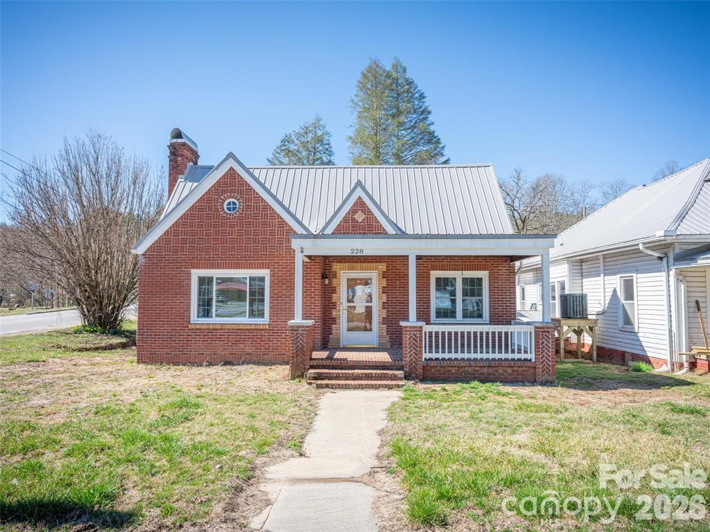 Recently renovated, this home is conveniently located and riverfront on the French Broad. There are hardwood floors throughout, living on the main level, two fireplaces, and all on a flat lot. The space upstairs is ideal for an office, media room, or extra storage. The home is a short distance to the community park and only fifteen minutes to downtown Brevard. Gorges State Park and Lake Toxaway are also just a short drive away.
