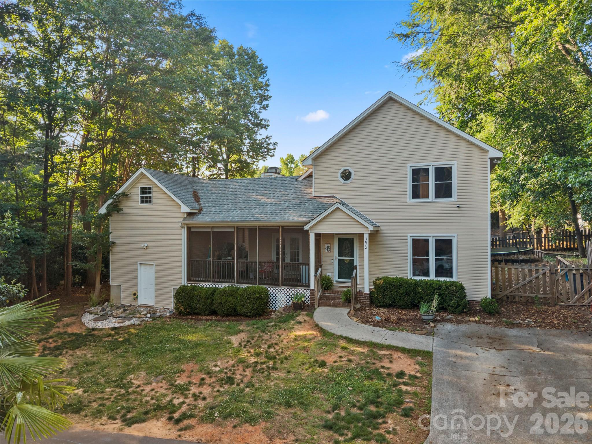 Welcome to Tega Cay, where charm, lake living, and a vibrant community come together. This adorable 3-bedroom, 2-bath home offers something truly special — a separate mother-in-law suite/investment apartment with its own private entrance, completely independent from the main home. Opportunities like this are rare in Tega Cay.

The main home features neutral paint, LVP flooring, an oversized back deck perfect for entertaining, and a primary bedroom on the main level with a full bath for easy, comfortable living.

The additional apartment is fully equipped with its own heating and cooling system, kitchenette, living area, and an upper-level loft bedroom with a full bathroom. Whether you need guest space, rental income, or multigenerational living, this flexible setup checks every box.

Located in a highly desirable area with no HOA, access to lake life, and a pristine golf course community, this property truly stands out.

This home is ready for the right buyer to make it theirs. Book your showing before this one is gone.