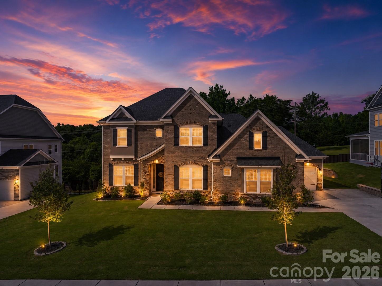 Welcome to 7186 Sumters Camp Trail, where timeless luxury, impeccable design, and exceptional craftsmanship come together in one of Indian Land's most sought-after communities. Better than new and meticulously maintained, this stunning residence offers nearly 4,000 square feet of elevated living space designed to impress at every turn.

From the moment you step inside, soaring 10-foot ceilings, abundant natural light, and designer finishes create an immediate sense of sophistication. Every detail has been thoughtfully curated, from the upgraded lighting throughout to the custom luxury accent walls that elevate the office, living room, and primary suite into truly unforgettable spaces.

At the heart of the home, the spectacular chef's kitchen seamlessly blends beauty and functionality. Featuring an oversized island, premium finishes, abundant cabinetry, and expansive workspace, it opens effortlessly to the spacious living area, creating the perfect setting for both everyday living and upscale entertaining. The open-concept design allows family and guests to gather comfortably while enjoying the home's warm yet refined atmosphere.

The luxurious main-level primary suite serves as a private retreat. Wake each morning in a space designed for comfort and relaxation, then escape to the spa-inspired bath featuring a stunning tile shower, elegant finishes, and a truly cavernous walk-in closet outfitted with custom built-in storage.

Offering 5 bedrooms, 3 full baths, and 1 half bath, this home provides exceptional flexibility for families, guests, work-from-home professionals, and multi-generational living. Every room reflects the same level of care and attention to detail that defines the entire property.

Outside, the home's curb appeal is complemented by a desirable homesite and an oversized 3-car garage, providing ample space for vehicles, storage, hobbies, and more.

Located in The Estates at Covington, residents enjoy a premier Indian Land location just minutes from Ballantyne's shopping, dining, entertainment, and employment centers while benefiting from award-winning schools and exceptional community amenities.

Luxury. Condition. Design. Location. Opportunities like this are rare. 7186 Sumters Camp Trail offers the perfect combination of modern elegance and everyday livability for buyers seeking a home that stands above the rest.