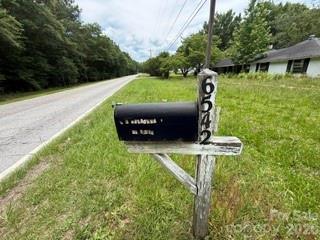 Welcome to 6542 Highway 341, Kershaw, SC! Situated on over 2 level acres, this property offers endless possibilities for investors, builders, or buyers looking to create their dream home.
A solid existing foundation provides the opportunity to rebuild, or you can clear the lot and start fresh with your own custom home. As part of an estate, the seller has never occupied the property and is selling it strictly As-Is, with no repairs to be made.
Whether you're looking for your next renovation project, investment opportunity, or a beautiful homesite with plenty of space, this property is full of potential. Bring all offers—investor special!