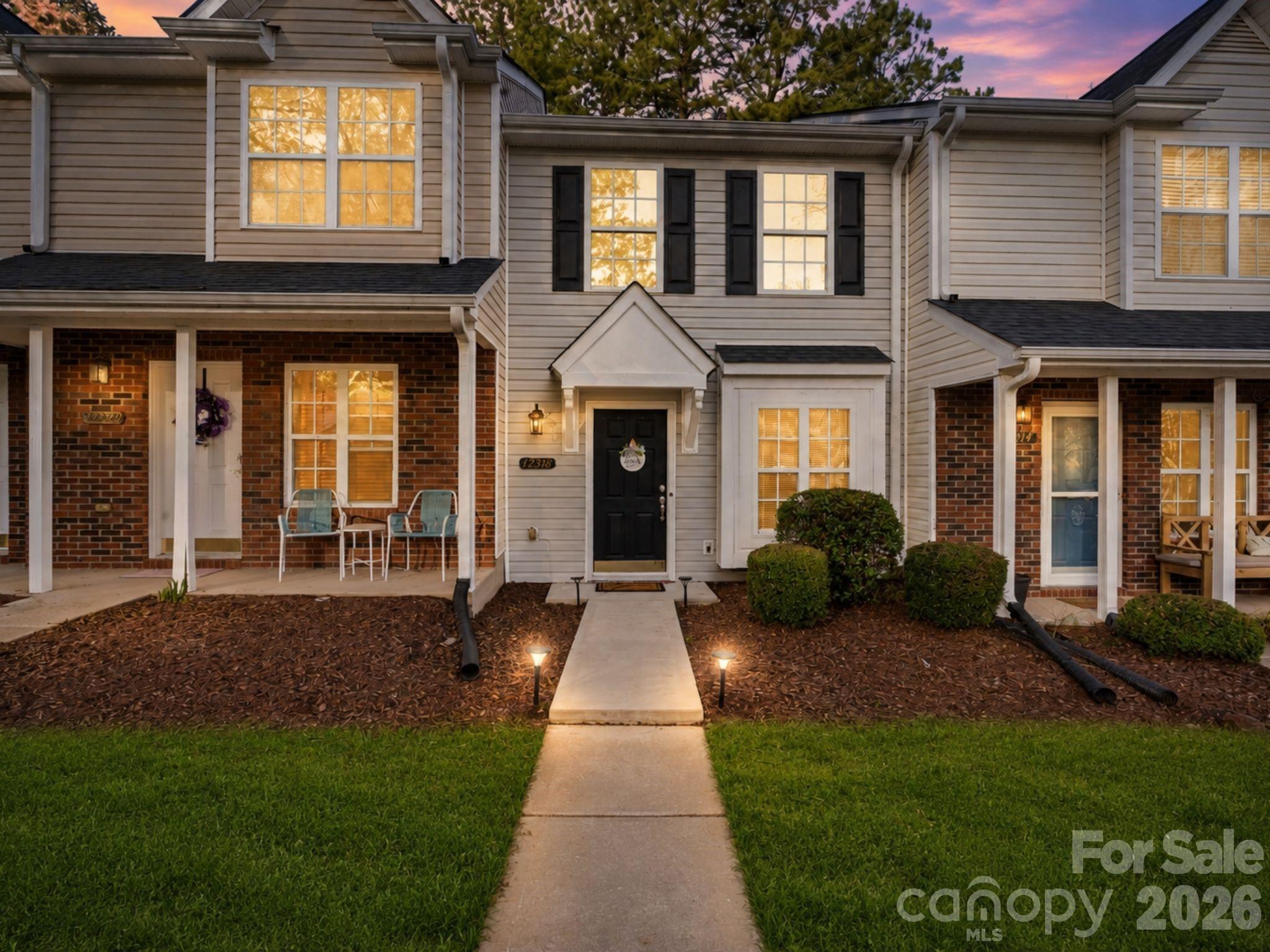 BUYER CHOICE INCENTIVE! With an acceptable offer, the seller is offering either a rate buydown to help lower monthly mortgage payments or one full year of HOA dues paid at closing. Choose the option that best fits your financial goals and enjoy added affordability from day one.

If you're looking to build equity instead of paying rent, this updated, move-in-ready townhome is an incredible opportunity to step into homeownership. Conveniently located just 20 minutes from Uptown Charlotte, minutes from Charlotte Douglas Airport, I-485, and Riverbend Village, you'll enjoy easy access to shopping, dining, and everyday conveniences. The local library and neighborhood dining are even within walking distance.

Inside, you'll find a beautifully updated kitchen featuring quartz countertops, a farmhouse sink, freshly painted cabinetry, and durable LVP flooring throughout. Additional updates make this home truly move-in ready.

HOA dues include year round lawn maintenance, water, sewer, trash service, community pool access, scenic pond area, and the community's master insurance policy. 

Even better, this property may qualify for nearly 18 homebuyer assistance programs that could help eligible buyers with down payment assistance, closing costs, and other upfront expenses. Combined with the seller's buyer-choice incentive and potential down payment assistance programs, this home offers an affordable path to homeownership with fewer maintenance responsibilities than many detached homes.  Whether you're a first-time buyer looking for an affordable path to homeownership or an investor seeking a low-maintenance property in a growing area, 12318 Hennigan Place offers exceptional value. Schedule your showing today!