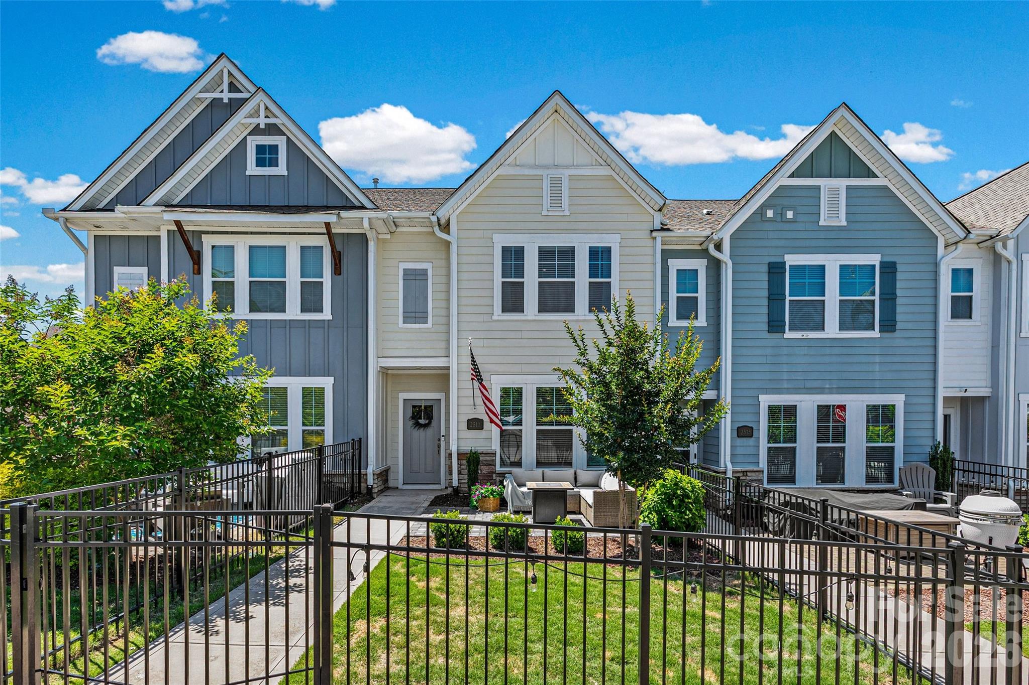 Walkability is key with this beauty! Almost new townhome in the heart of everything.  Can walk to the light rail station for easy commute uptown, walk to NoDa or Plaza Midwood areas and all they have to offer for restaurants and shopping.   This gorgeous home offers larger fenced front yard with paver patio living area and grass with landscaping to enjoy outdoors! First floor is an open concept floorplan with great room, kitchen and dining area that are happy and bright.  Also 1/2 bath and large pantry.  Oversized kitchen island for cookig enthusiants and to anchor the party.  Second floor features spacious  primary bedroom and spa like bathroom with walk in closet, 2 more bedrooms , full bath, laundry and large landing with sitting area. Third floor offers another bedroom/bonus room/man cave with additional full bath to accommodate all your guests and privacy or quiet office.  There is oversized storage room/mechanicals on the 3rd floor also.  2 car garage completes the package of this home.  Location is everything!  Charlotte International Airport is only 30 minutes.  Neighborhood is family friendly .  Welcome home to Charlotte and all the great things it has to offer .