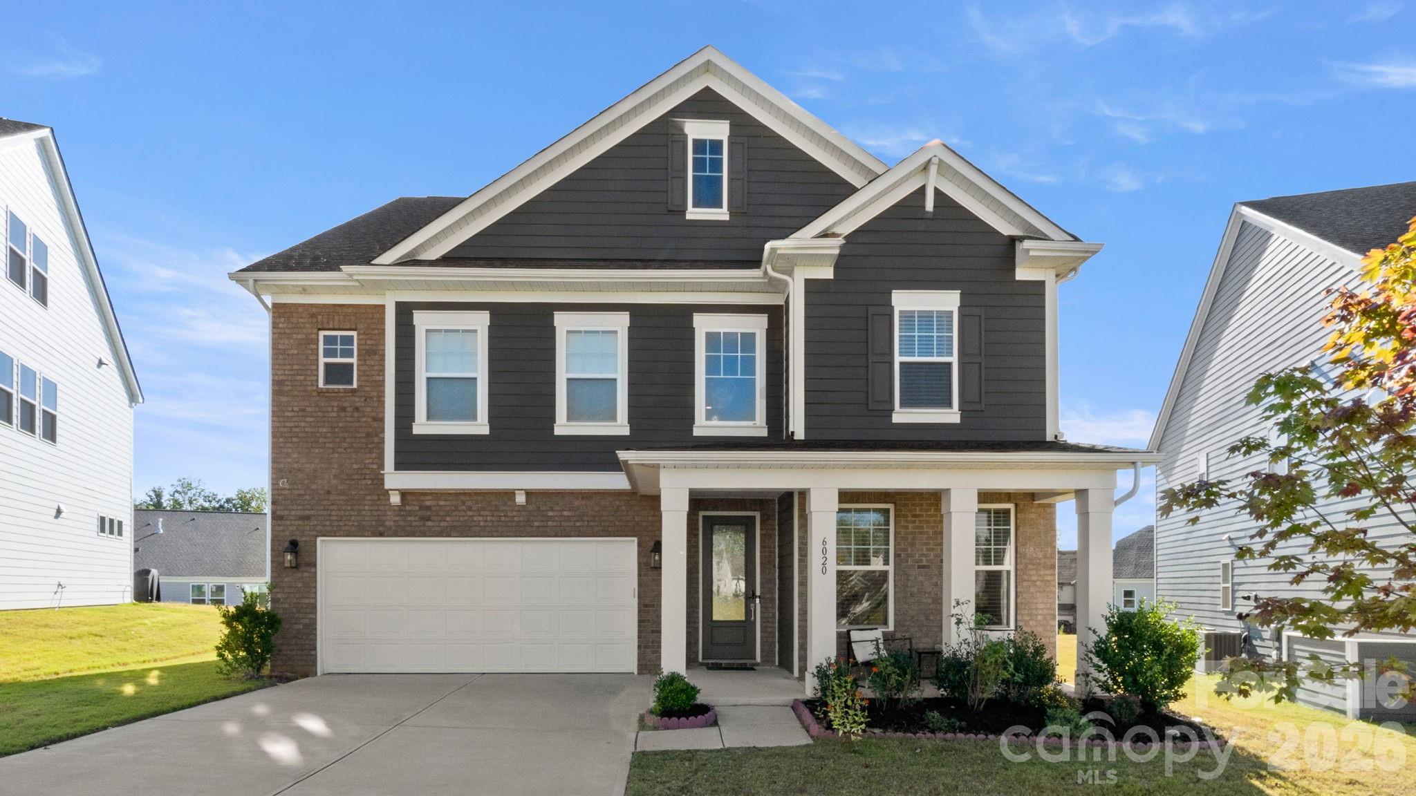 Welcome to this stunning three-story home in the highly desirable Massey community, where thoughtful design, spacious living, and timeless style come together. This 4-bedroom, 3.5-bath residence offers flexible spaces for work, relaxation, and entertaining — perfect for today’s modern lifestyle.
The inviting main level features an open-concept layout that seamlessly connects the living room, dining area, and kitchen. The chef’s kitchen is equipped with granite countertops, stainless steel appliances, a large island, and abundant cabinetry, making it both functional and beautiful. Just off the main living area, you’ll find a bright sunroom overlooking the backyard — an ideal spot for morning coffee or quiet afternoons.
At the front of the home, a private office with elegant French doors provides a quiet retreat for working from home or managing daily tasks, offering both privacy and natural light.
Upstairs, the primary suite serves as your private haven, featuring a spacious bedroom, walk-in closet, and a luxurious en-suite bath with a double vanity, a soaking tub, and a separate shower. Three additional bedrooms on this floor share 2 well-appointed full baths and offer plenty of flexibility for family, guests, or hobbies. There is also a large loft perfect for a 2nd family room.
The third floor expands your living space with a large bonus room perfect for a teen suite, guest area, or media room.
Outdoor living is just as inviting. Step outside to a beautiful backyard, ideal for play, pets, and entertaining. Whether you’re hosting a summer cookout or enjoying a quiet evening under the stars, this backyard is your private escape.
Located in the sought-after Massey neighborhood, residents enjoy resort-style amenities including a community pool, clubhouse, fitness center and 3 playgrounds. Plus, you’ll love being part of the award-winning Fort Mill School District and just minutes from shopping, dining, and major commuter routes.
This beautifully maintained Massey home combines comfort, functionality, and community — offering everything you’ve been looking for and more.
