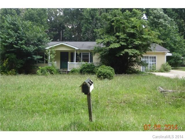 The house is on a nice, level lot with a very private back yard. The front is planted with large shrubs and small trees. There is a covered front porch and a screened back porch. A very large paneled family room has been added with a wood burning fireplace.  Limited service listing. Sold As is. Vacant no appointment required. Per seller all offers must be submitted on Hubzu.com.