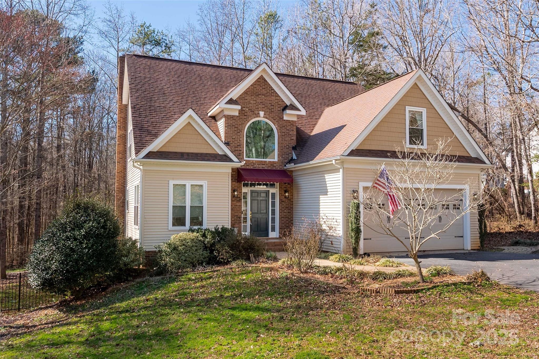 Lovely home and 4.7 acres near Waxhaw.  Privacy abounds at this unique custom built home - gorgeous windows showcase the natural lighting and treed views. Gleaming refinished hardwood floors, primary on main, partially finished basement. 2-story foyer and living rm w/ FP, dining rm, kit w/eat-in breakfast and bar seating, loft, office/flex, spacious bedrooms/bonus. Expansive deck is vinyl with interlocking boards so underneath is perfect for a sitting area. Basement offers rental potential as it has a separate entrance, living area, kitchenette (no stove) and flex/Br and full BA. There is also a workshop/gym area w/tons of storage. Basement is not heated/cooled but has electric/plumbing. Expansive partially fenced backyard and stone firepit area. Recent upgrades include (2) Hvac units (2023), fresh paint, windows w/low-e glass (Oct. 2020) 35-year architectural shingle roof (2014), 220 volt/3phase outlet in gar.  Storage building for lawn equipment. Fenced garden area with garden boxes.