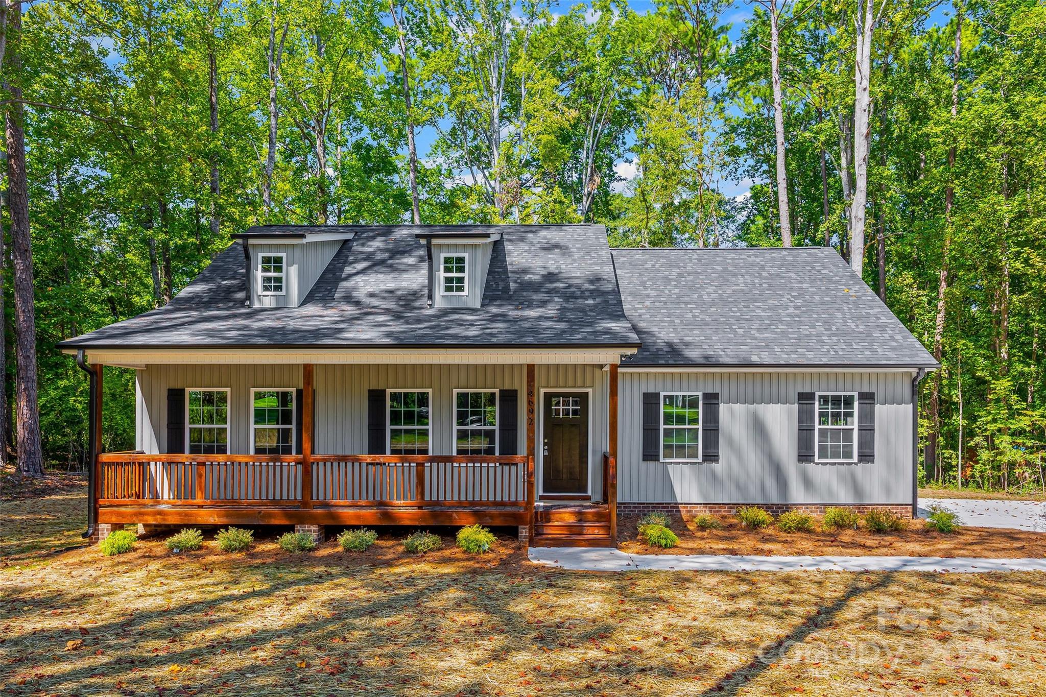 New construction alert! This 3-Bedroom, 3 Full Bath beauty sits on a spacious 0.92-acre corner lot with NO HOA and county taxes only—the freedom you've been looking for! The smart floor plan includes a finished bonus room and full bathroom over the side-load 2-car garage, perfect for a home office, gym, or extra guest space. All bedrooms and baths are generously sized, and the layout is designed for easy living.  Relax on the large covered front porch or entertain out back on the covered rear porch—perfect for Carolina evenings. Located perfectly between Rock Hill and York, you're just minutes from the best of both towns while enjoying a peaceful, country-like setting. Don’t miss your chance to own a brand-new home with space to breathe and room to grow.