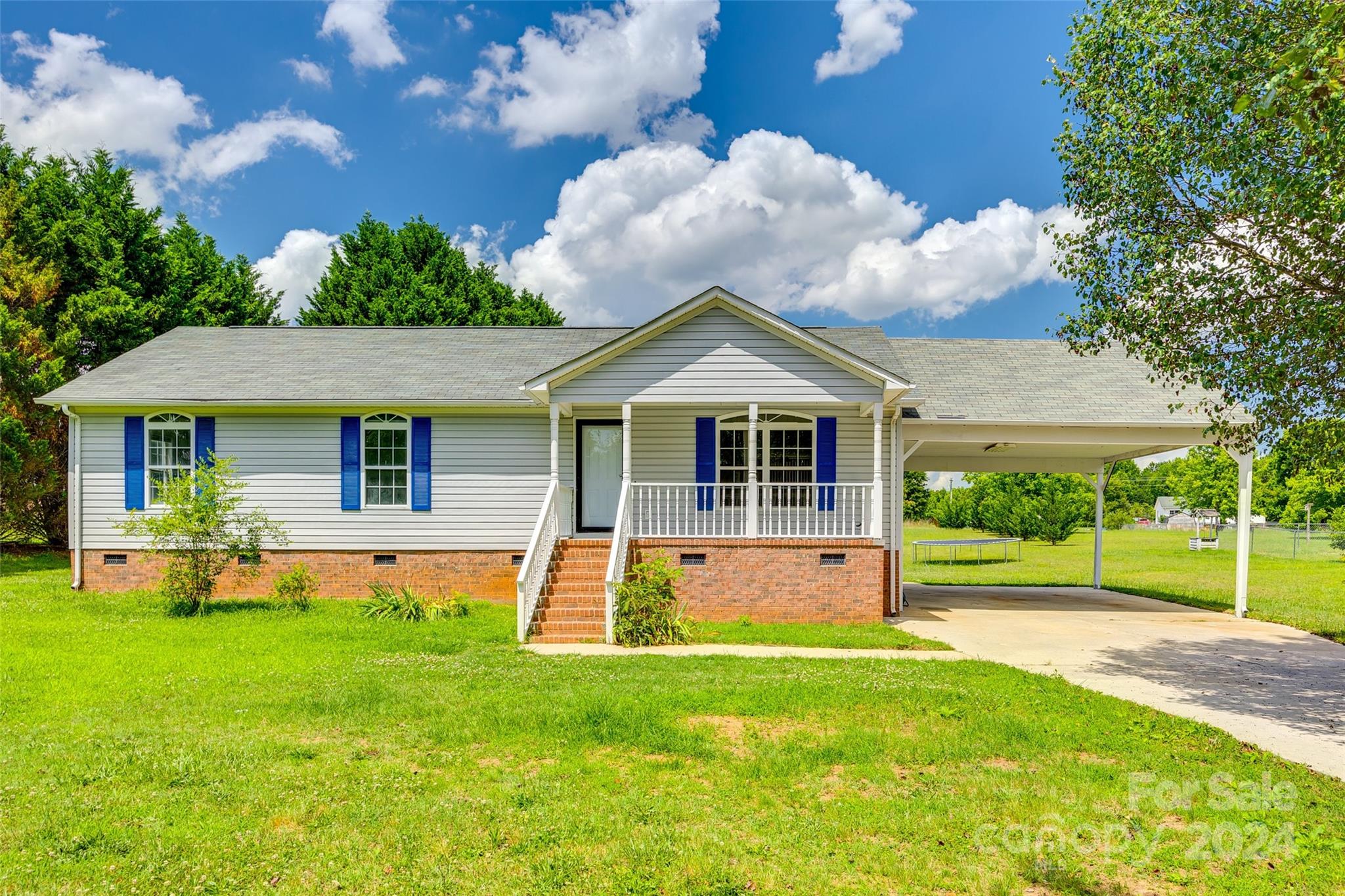 Welcome to this delightful 3-bedroom, 2-bathroom ranch home offering 1,440 square feet of comfortable living space. Inside, you'll find numerous updates, including a new water heater, fresh carpet, new bathroom floors, and a fresh coat of paint throughout. The HVAC system is only 10 years old. The home has been thoroughly pressure washed and comes with all appliances included, ensuring a hassle-free move-in experience. Plus, with no HOA fees, you have the freedom to enjoy your property without restrictions. Outside, this property shines with 1.09 acres of flat, shaded land. The new roof and new back deck add to the home's charm and functionality. You'll find a carport for convenient parking, and the yard features lovely pecan trees, Japanese maples, and blueberry bushes, along with plenty of space for gardening and outdoor activities. This home combines indoor comfort with outdoor beauty, making it the perfect retreat. Don’t miss the chance to make this charming property your own.