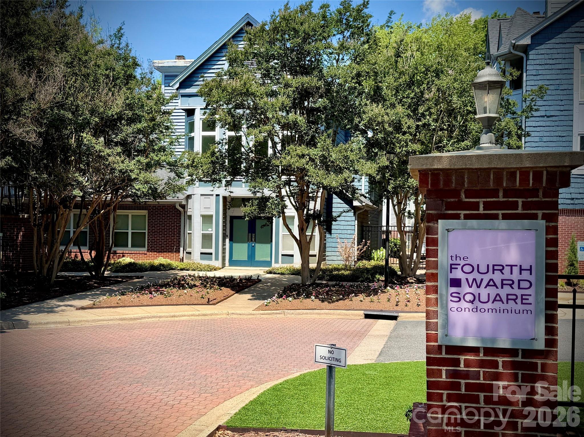 Welcome to Fourth Ward Square, where Uptown convenience meets resort-style living. This beautiful 1-bedroom, 1-bath second-floor condominium offers an open and airy layout with hardwood-style flooring throughout the main living areas, abundant natural light, and tranquil pool views from the spacious bay window. The kitchen features granite countertops, stainless steel appliances, sleek cabinetry with glass accents, and a breakfast bar overlooking the living space—perfect for entertaining or everyday living.
The primary bedroom includes brand new plush carpeting, while the stylish bath offers granite counters, vessel sink, and tiled shower surround. The inviting living room is anchored by a fireplace with custom built-ins and flows seamlessly to the dining and kitchen areas. Enjoy overlooking the beautifully landscaped courtyard and sparkling community pool from the comfort of your home.
Located in the highly desirable Fourth Ward neighborhood, this community offers unbeatable access to Uptown Charlotte, Panther Stadium, Truist Field, restaurants, parks and nightlife. Resort-style amenities complete this exceptional urban retreat.