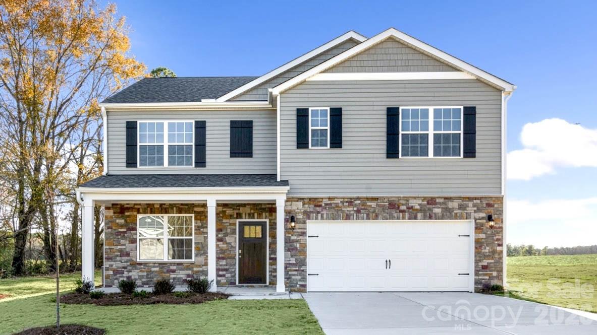 The Hayden offers 5 bedrooms, 3 bathrooms, and 2,511 sq. ft. of space. This spacious two-story home includes a kitchen with a walk-in pantry, granite countertops, and stainless steel appliances, overlooking the living and dining areas. A guest bedroom and full bath are conveniently located on the first floor. The spacious primary bedroom upstairs includes dual walk-in closets and a luxurious bath with dual vanity and walk-in shower. The second floor also features three additional bedrooms and a loft, ideal for family entertainment. The Hayden is the ideal place for family living.