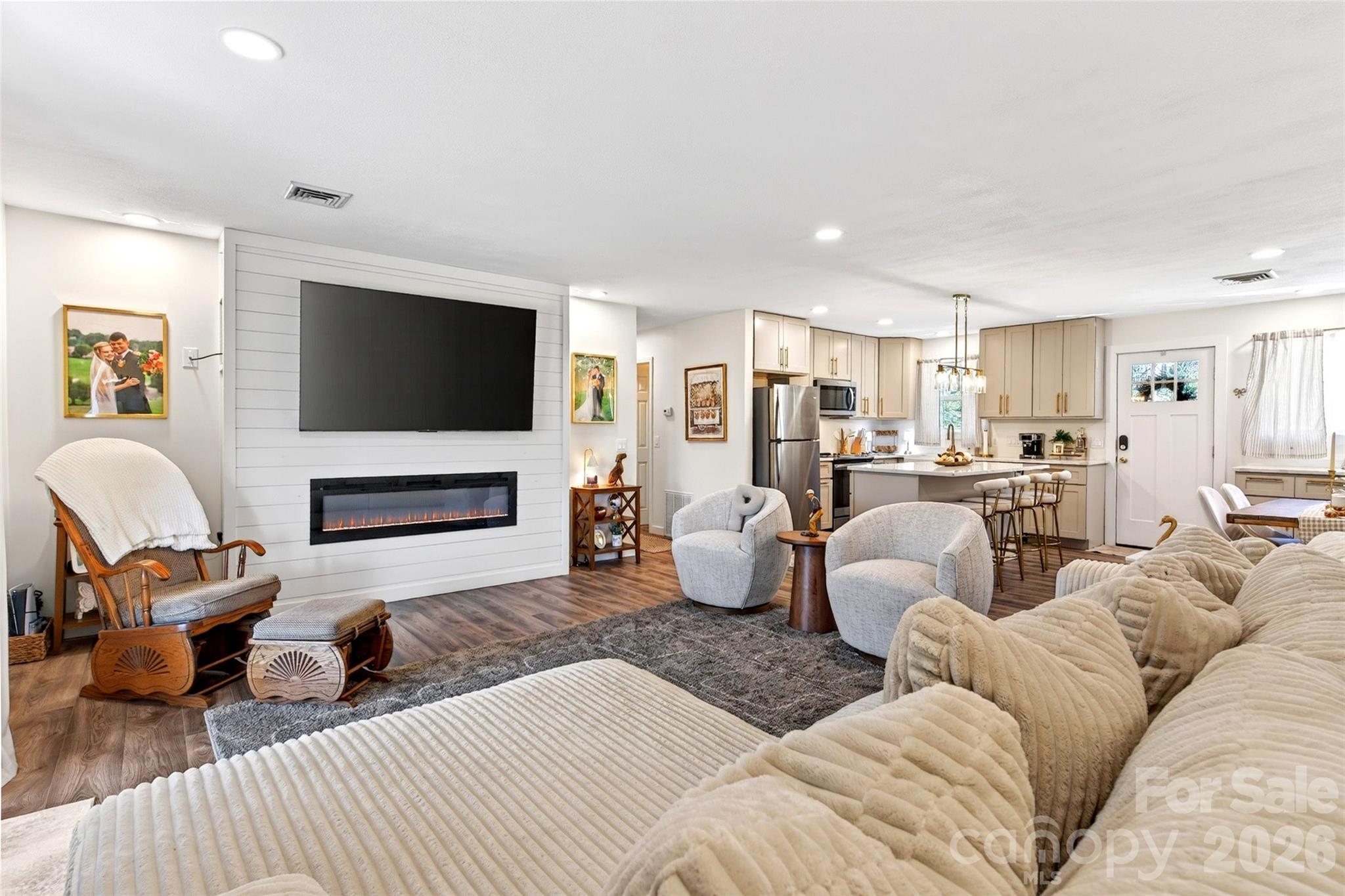 This head-to-toe renovated condo on the Grassy Creek Golf Course is the kind of opportunity that rarely comes along. Every inch has been updated, delivering a true floor-to-ceiling transformation that blends style + comfort.

Step inside to find a bright, elevated interior anchored by stunning quartz countertops featuring soft white tones with  gold veining—an understated luxury that sets the tone throughout the home. 

The open-concept living space flows seamlessly, creating an inviting atmosphere whether you're hosting or unwinding. Offering approximately 1,200 square feet, this condo features 2 bedrooms and 2 full baths, perfectly suited for full-time living or an investment opportunity. 

Positioned directly on the Grassy Creek Golf Course, your backyard becomes an ever-changing landscape of rolling greens and mountain air. And when you're ready to explore, you're less than 5 minutes from the entrance to the Blue Ridge Parkway—placing some of the most breathtaking scenery in the region right at your fingertips. Plus, enjoy the convenience of being under an hour to Asheville or Johnson City.

Turnkey, low-maintenance, and undeniably stylish—this is the epitome of mountain living!