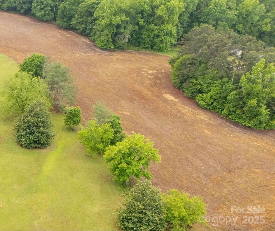 Nearly 12 Acres in Rich Hill Community! Nestled in the peaceful and sought-after Rich Hill Community of Lancaster, SC. With plenty of room to roam, garden, or simply unwind, this property is a rare opportunity to enjoy privacy and space while still being convenient to local amenities. Don’t miss your chance to own a slice of peaceful country living.