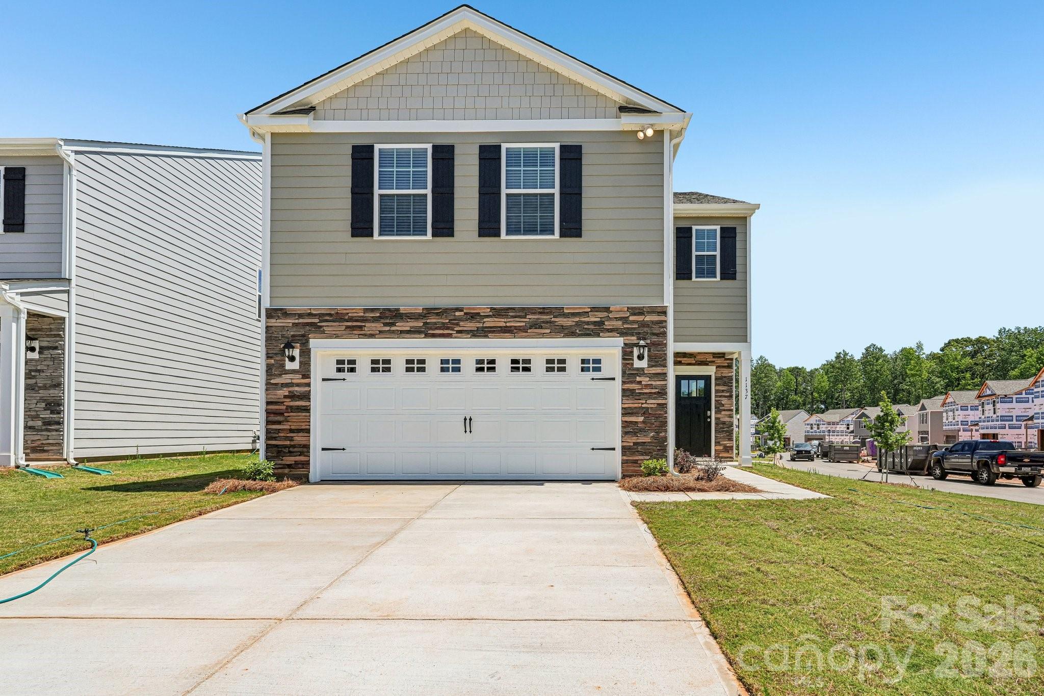 Come see 1137 Saloon Drive located in York, South Carolina!

Welcome home to Fergus Crossing in Historic York, SC! This beautiful, brand new, move-in-ready home is in the charming and historic town of York, SC. York, SC is a short drive away from Charlotte, NC, just 28 miles away. Nestled in the desirable community of Fergus Crossing, residents enjoy outstanding amenities, including a pool, playground, pickleball courts, and walking trails. With its modern design, great location, and unbeatable price, this home offers exceptional value and comfort. Don’t miss your chance to make it yours!

The Elston is a spacious and modern two story home plans featured at Fergus Crossing in York, SC offering 6 modern elevations. The home features four bedrooms, two and a half bathrooms, and two-car garage.
The open concept layer connects the home beautifully, where the inviting foyer will lead you into the heart of the home, where the kitchen and large family room meet to create a welcoming atmosphere. The kitchen’s stainless steel appliances, ample cabinet space, and a center island make it perfect for cooking and entertaining.
 The home features a primary suite with a walk-in closet and an en-suite bathroom with dual vanities. The additional three bedrooms provide privacy and comfort and share access to a secondary bathroom. A loft space on the second floor can be used as a media room, home office, or playroom. Additional features include a laundry room, ample storage closets, and large windows for natural light.
With its thoughtful design, spacious layout, and modern conveniences, the Elston is the perfect place to call home at Fergus Crossing. Community offers pool, cabana, pickle ball, playground and walking trails in sought after location, close to Rock Hill and Fort Mill conveniences.