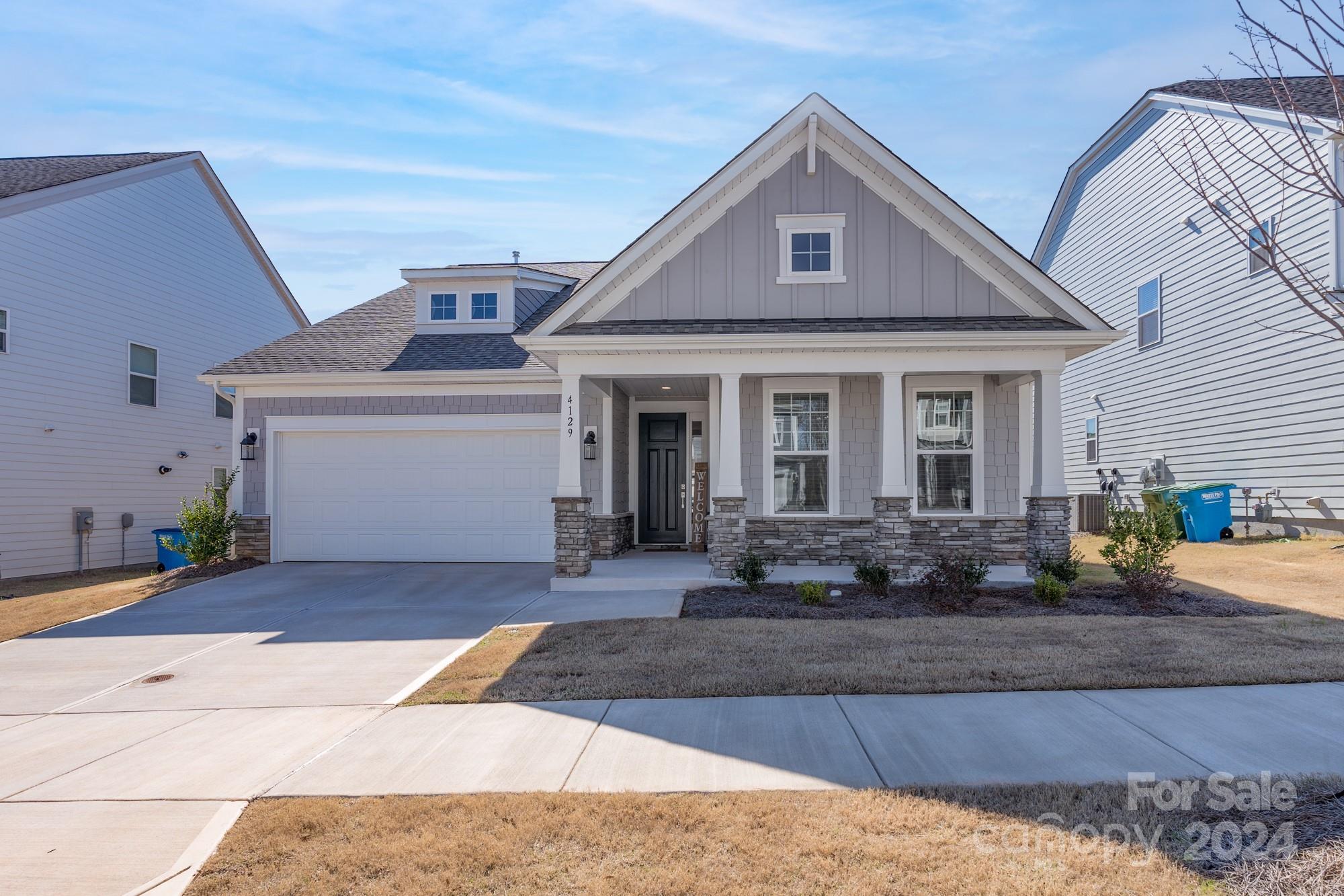 Welcome to the beautiful 1.5 story home built by Taylor Morrison in 2023! Home is practically brand new. Step through the inviting front door into a cozy foyer that leads to an open-concept living area, perfect for entertaining guests or enjoying quiet evenings. First floor boasts 3 bedrooms including the primary bedroom. Upstairs you will find a large, sun-filled bonus room and a guest bedroom and bath. No carpet on the first floor. Conveniently located near schools, parks, and shopping, this 1.5 story home offers the perfect blend of comfort, convenience, and charm. Don't miss your opportunity to make it yours!
Community features lazy river pool and fitness center.
