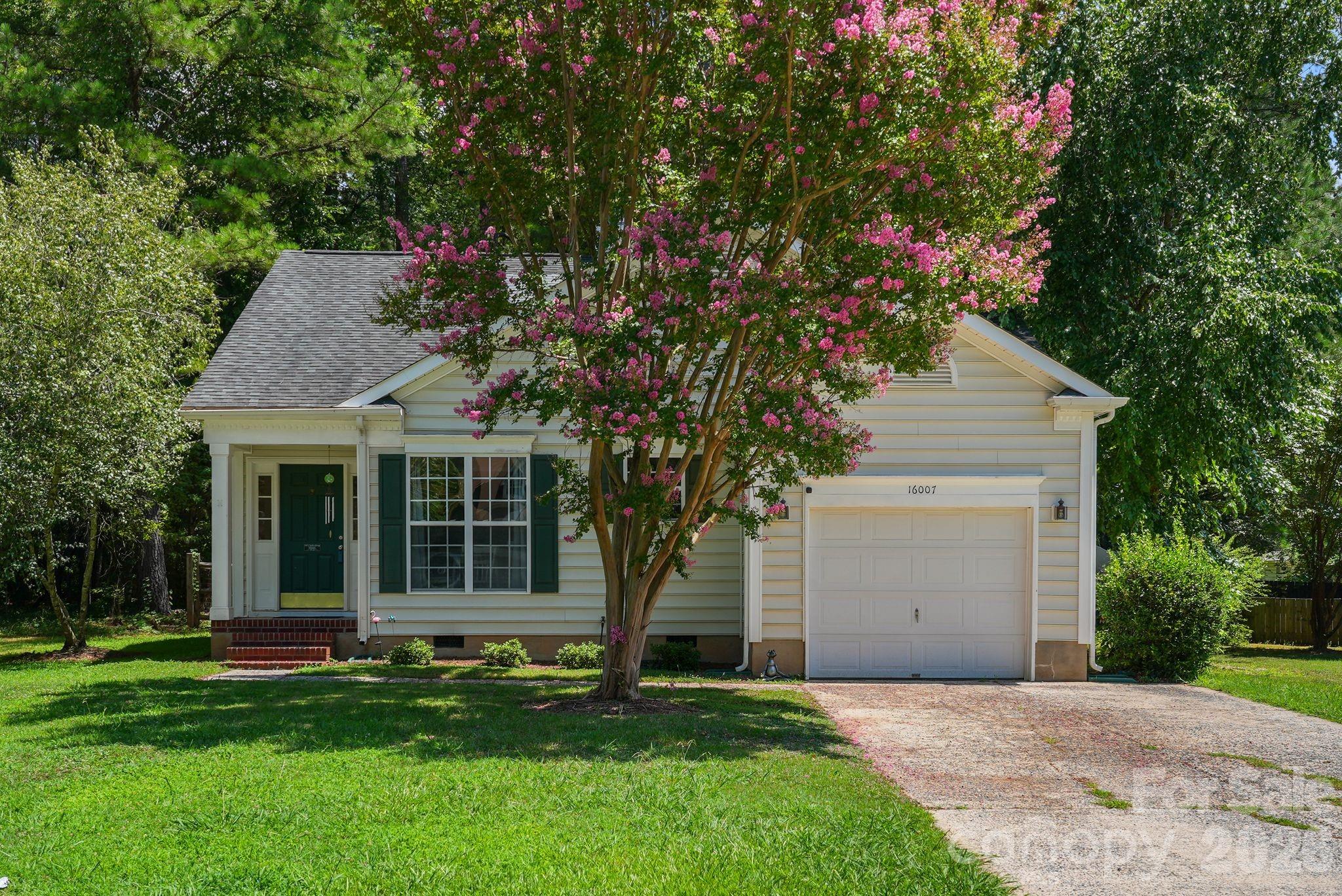 3-bedroom, 2-bathroom ranch in Steelecroft Place in the Steele Creek corridor of Charlotte, North Carolina 28278, positioned on a quiet cul-de-sac with a private, wooded backyard on a 0.26-acre lot. This one-story home features 2026 improvements including new granite countertops in the kitchen, smooth ceilings with popcorn texture removed, fresh interior paint, and a new water heater — move-in ready in one of Charlotte's most connected southwest locations.

The open layout flows from the kitchen through the living room, which features a gas fireplace. The primary bedroom suite includes a walk-in closet and an en-suite bathroom with dual vanity. Two secondary bedrooms each feature custom closet systems for built-in organization. Luxury vinyl plank floors run throughout the main level. A dedicated laundry room is conveniently located on the main level, and all appliances convey — refrigerator, washer, dryer, electric range, dishwasher, and disposal included. The covered rear porch overlooks a wood-fenced, wooded backyard offering privacy and natural surroundings rarely found at this price point. The attached garage provides additional storage and direct home entry. City water and city sewer.

Location is where Steelecroft Place truly stands out. Minutes from I-485, Charlotte Douglas International Airport, Lake Wylie, and McDowell Nature Center and Preserve — a 1,132-acre preserve with hiking trails and waterfront access along the shores of Lake Wylie. Carowinds, Charlotte Premium Outlets, and an extensive corridor of dining and shopping along Steele Creek Parkway and South Tryon Street are all within minutes. Steelecroft Place community amenities include an outdoor pool, playground, pond, recreation area, sidewalks, and walking trails.