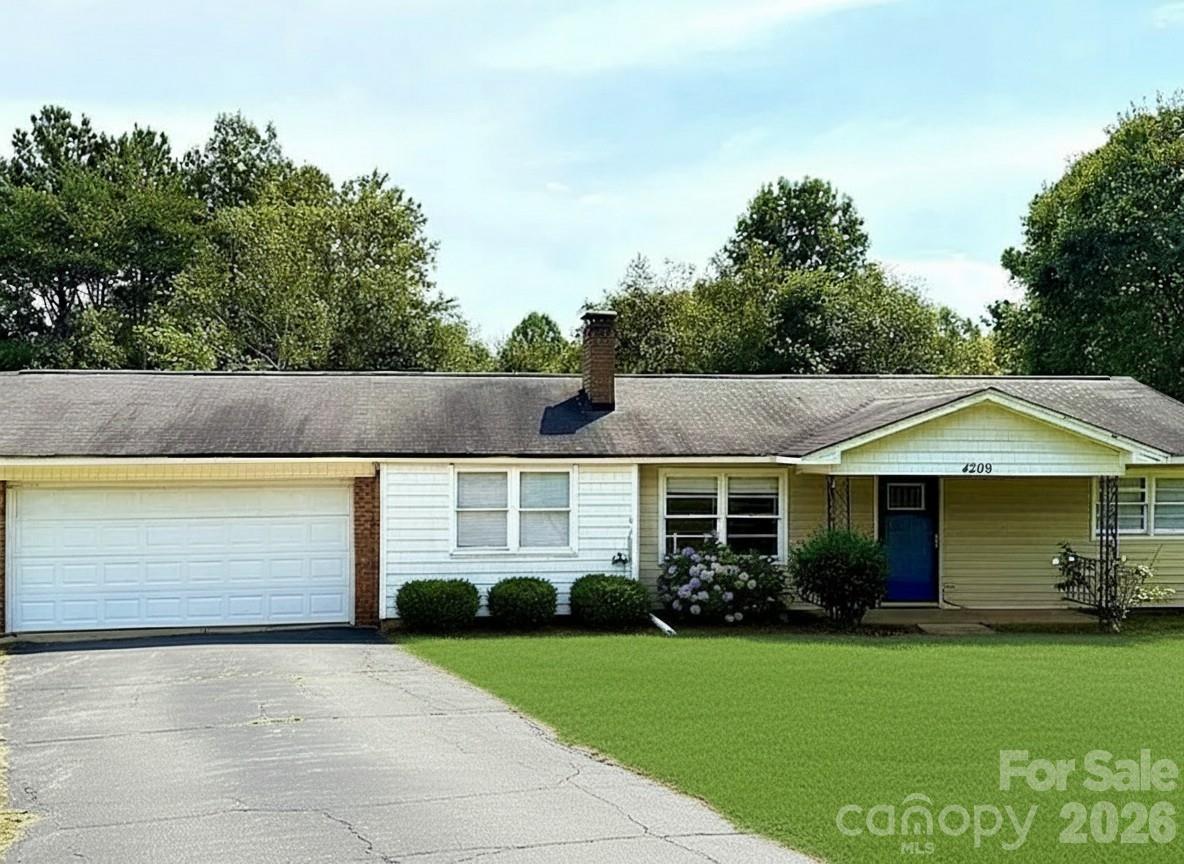 Discover this affordable one-story home in a rural Shelby setting. Returning to the market at a very competitive price - an excxellent opportunity to own this home as your residence or an investment property at an exceptional value! Offering 3 bedrooms (septic permitted for 2) and 1 full bath, the home features a welcoming great room with fireplace and a kitchen equipped with electric range, microwave, refrigerator, and subway tile backsplash.  With laminate wood and tile flooring throughout, it’s clean, well-maintained, and move-in ready. A double garage provides plenty of storage and parking, while the large lot offers space to enjoy the outdoors. Select photos feature virtual staging and image enhancement for marketing purposes, allowing you to better visualize the scale and functionality of the space.  Don't miss your chance to act quickly!