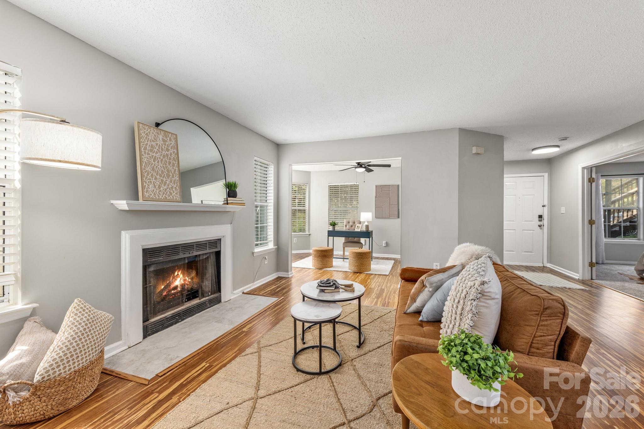 Tucked into the park-like setting of Bennington Woods, this beautifully updated ground-level condo offers comfort, convenience, and effortless living.

With a main level floor plan, two spacious bedrooms, and two full bathrooms, the layout provides both privacy and functionality. The living room features a cozy fireplace and opens to a versatile bonus space perfect for a home office, den, or sunroom — whatever suits your lifestyle.

The fully renovated kitchen and updated bathrooms bring a fresh, modern feel, complemented by new carpet, updated lighting, fresh paint, and a truly move-in ready finish throughout.

Enjoy ground-level access with no interior or exterior stairs, easy connection to the greenway from the community, and resort-style relaxation by the neighborhood pool. Just minutes from SouthPark and the dining and retail along South Boulevard, this location blends peaceful surroundings with everyday convenience.

You’ll love calling Bennington Woods home.