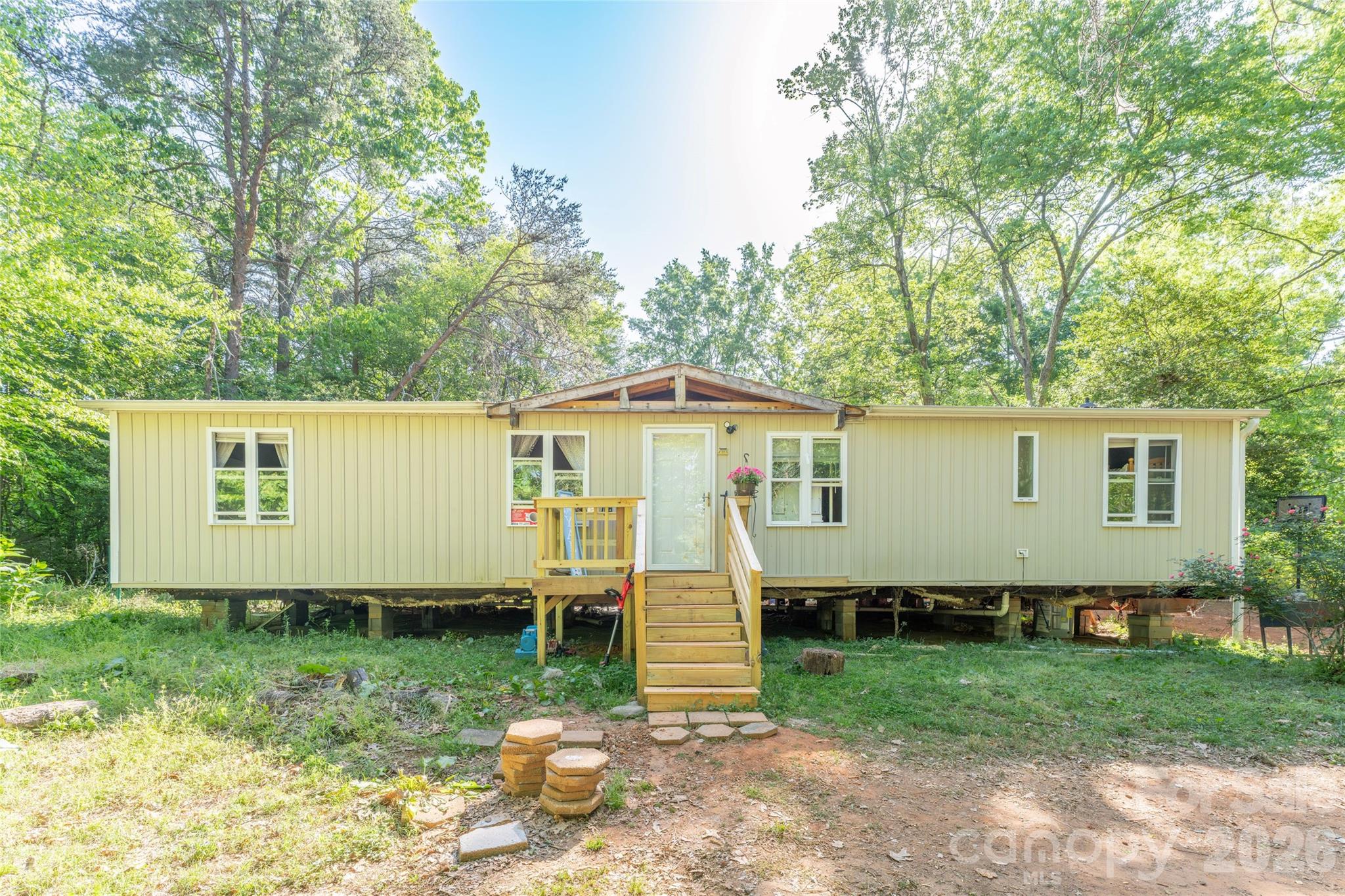 PRICE REDUCTION! MAKE THIS YOUR OWN! LAND IS HARD TO FIND this is a good chance to get your privacy yiu have been looking for! This home is located on a .917/acre lot in Catawba Springs Township. This is in the Knottingham Forrest Subdivision. The roof and plumbing are brand new. The home features a split bedroom plan. Property also offers garage for storage. This is a good house for someone looking for privacy and a big yard.