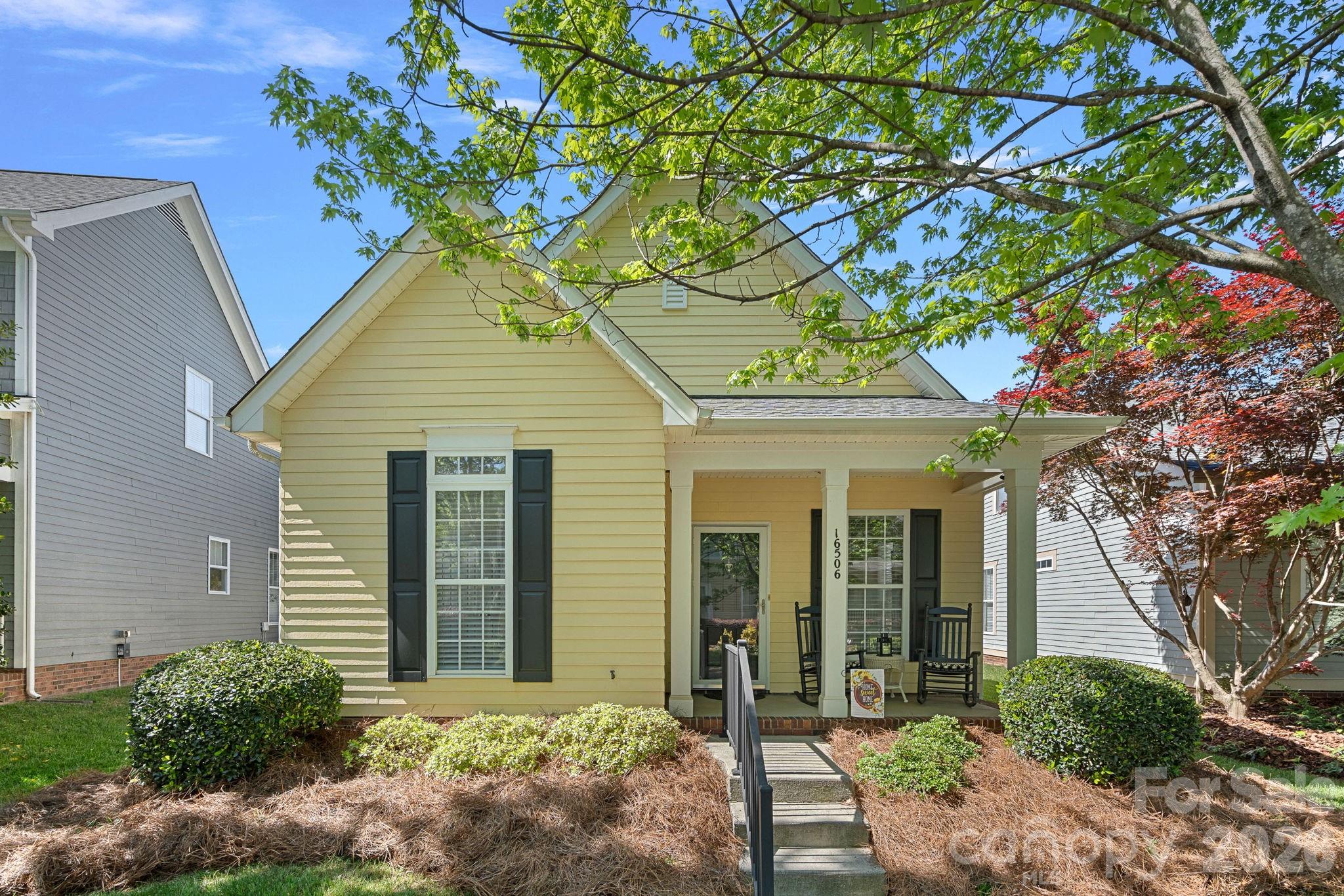 Set within a highly sought-after Charleston-style community, this charming one-story home offers the perfect blend of timeless character and effortless, single-level living. A classic front porch creates an inviting first impression—ideal for morning coffee, evening unwinding, and connecting with neighbors in this warm, walkable setting. Inside, you’ll find a thoughtfully designed floor plan that is rarely available and highly coveted for its functionality and flow. With all living spaces conveniently located on one level, this home caters to both ease and comfort—perfect for those seeking a low-maintenance lifestyle without sacrificing style or space.Lovingly maintained by its original owner, the home reflects pride of ownership throughout. Recent updates, including beautifully refreshed flooring, bring a modern touch while preserving the home’s inherent charm. Natural light fills the living spaces, enhancing the open feel and creating a welcoming atmosphere for both everyday living and entertaining. Each space flows seamlessly, making the home feel both functional and inviting. Beyond the home itself, the community is a true standout—known for its picturesque streetscapes, charming architecture and strong sense of community. Residents enjoy close proximity to shopping, dining, and everyday conveniences, all while being tucked into a neighborhood that feels both peaceful and connected. For buyers seeking a rare combination of no stairs, an exceptional floor plan, and a highly desirable location, this home presents an incredible opportunity. Additional updates include:roof 2020, HVAC 2018, water heater 2018. Whether you’re downsizing, right-sizing, or simply looking for that perfect blend of charm and convenience, this property delivers. Welcome home!