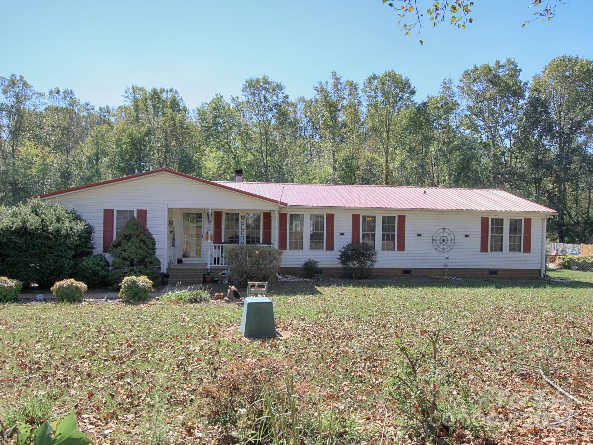 Looking for Privacy! Ranch home setting on 2.18 acres. 2170 Sq Ft, 3 bedrooms, 2.5 baths with open concept living and split bedroom floor plan. Huge kitchen with Corian counter tops, lots of Cabinets, Island with Drop In Stove. Wall Oven, Microwave, breakfast area, Cozy Dining room. Large Living room with wood burning Fireplace and Built Ins. Spacious Primary Bedroom with setting room or office and sliding door leading to covered back Deck. Beautiful Inground Pool with fence and lots of room for Chairs and entertaining. Enjoy cool evenings by firepit. Workshop and tractor shed, Large She Shed. Call for an Appointment today.