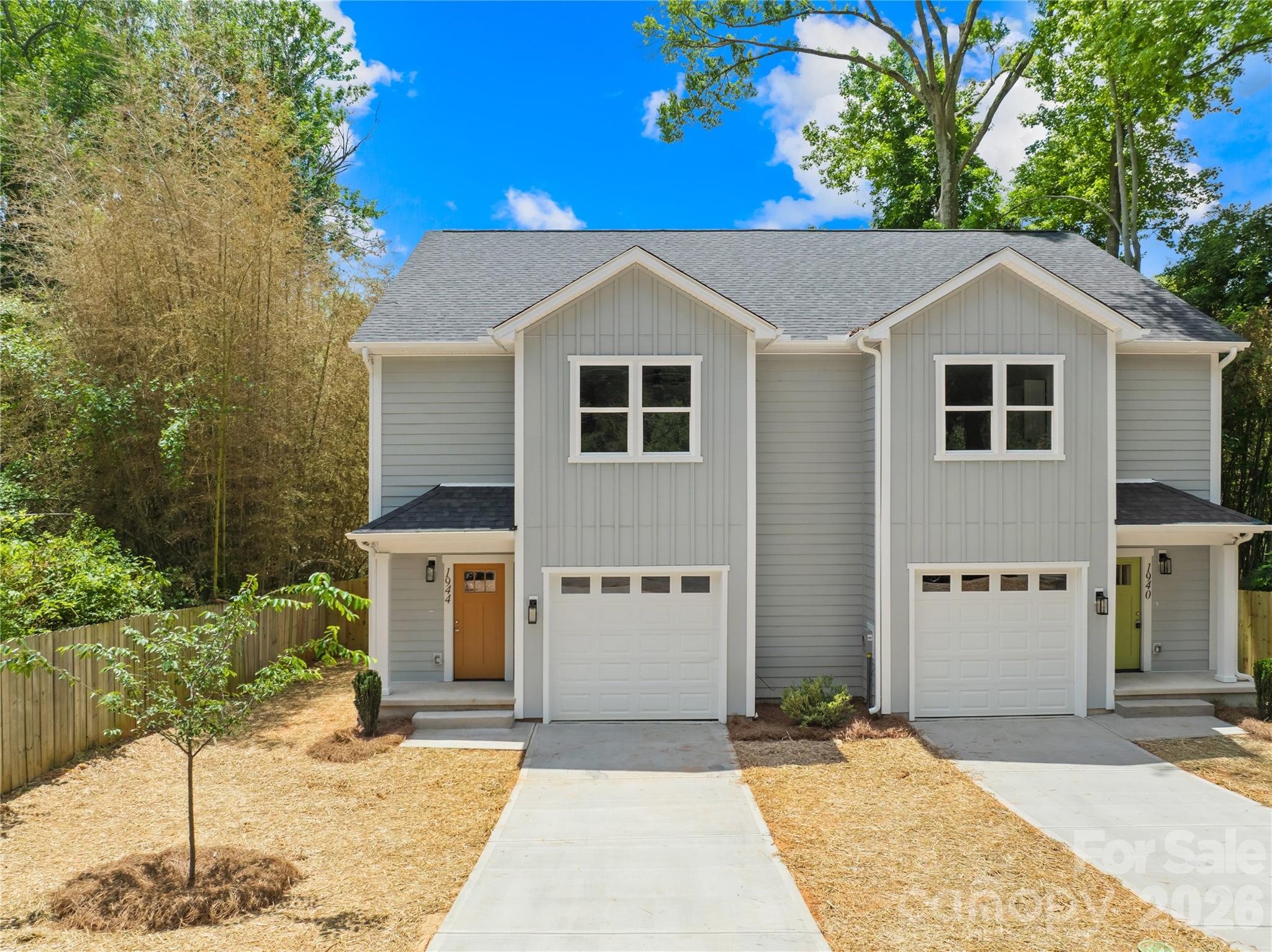 New construction near NoDa, Plaza Midwood, and Uptown under $400K — with a garage, fenced yard, no HOA, and land included.

This townhome-style duet offers a smart alternative to a traditional townhome complex. You get modern finishes, a functional 3-bedroom, 2.5-bath layout, private outdoor space, driveway parking, and an attached one-car garage.

Inside, you’ll find LVP flooring, quartz countertops, modern lighting, and an open main living area designed for everyday living. Upstairs, the spacious primary suite features a tiled walk-in shower and private ensuite bath.

Outside, each unit has its own fenced backyard, paved driveway, and attached garage — giving you more privacy and flexibility than many nearby townhome options.

Located less than 5 miles from Uptown Charlotte, approximately 3 miles from NoDa, and under 4 miles from Plaza Midwood, this home gives buyers close-in access without typical NoDa or Plaza pricing.

If you’ve been searching for newer construction near Uptown Charlotte with modern finishes, garage parking, outdoor space, and no HOA, this one is worth a look.