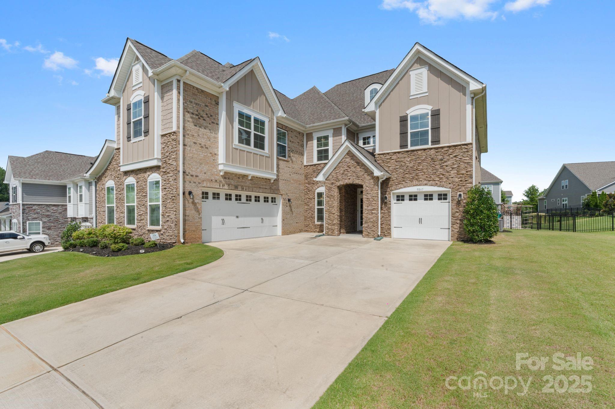 Luxury, comfort, and privacy await at 9845 Verdun Ct in an exclusive gated Bretagne community. This open-concept home is filled with natural light, highlighting custom finishes throughout. The chef’s kitchen features stainless steel appliances, sleek cabinetry, ample counters, and a large island perfect for entertaining. The living area flows seamlessly with hardwood floors and a cozy fireplace. The primary suite offers a spa-like bath and walk-in closet. A 3-car garage adds storage and includes a whole-home water softener/filtration system. Enjoy outdoor living with a spacious patio and private yard. Minutes from Fort Mill and Ballantyne, this is a rare opportunity to own a serene, upscale retreat.