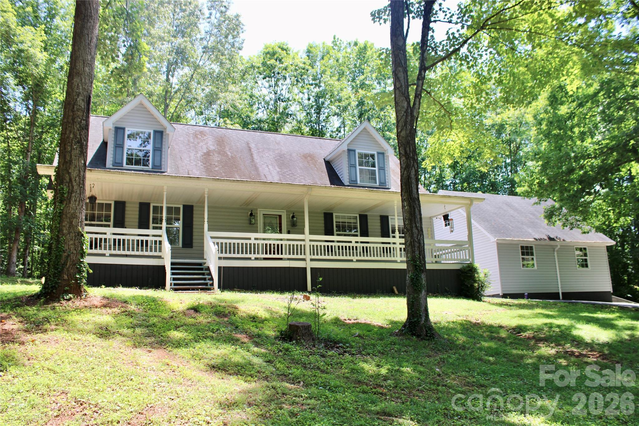This well-maintained, move-in ready home combines comfort, convenience, and practicality, making it perfect for any lifestyle. Boasting 4 spacious bedrooms and 2.5 bathrooms, this home offers ample space for families, entertaining, or simply enjoying your own retreat. The main level is designed for convenience and functionality, featuring two large bedrooms, including a primary suite with an en-suite bathroom, offering privacy and ease of access. An additional half bath on the main floor ensures guests are always accommodated. Upstairs, you'll find two generously sized bedrooms and a full bathroom, perfect for family members, guests, or a home office setup. The layout is flexible and adaptable to suit your needs. Additional highlights include a detached garage, providing secure parking and extra storage space, as well as a whole-house generator hookup, giving you peace of mind during power outages. The paved driveway adds to the property’s curb appeal and practicality. Agent is Owner.
