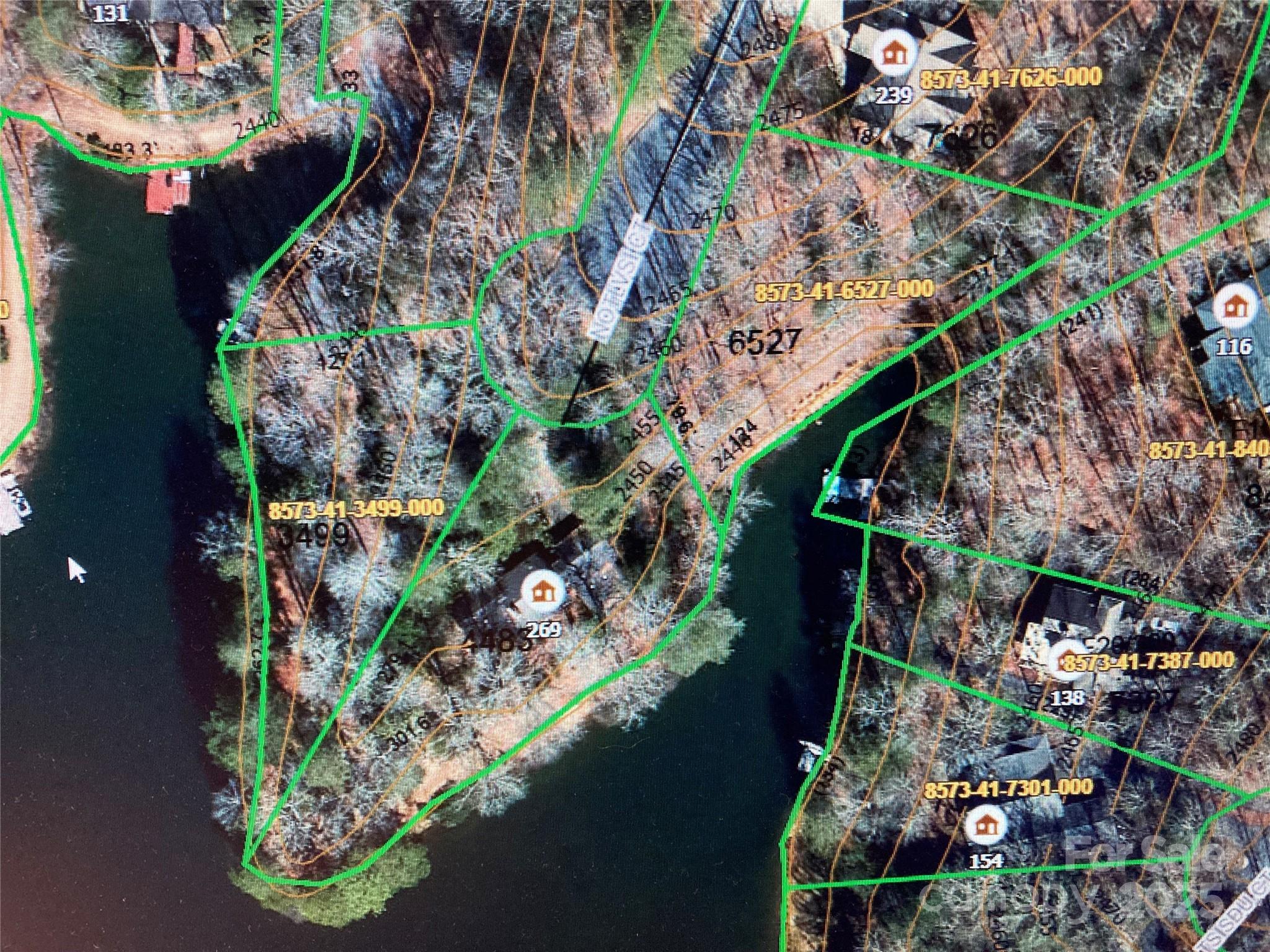 One of only 2 remaining premier building sites in Connestee Falls on Lake Wanteska!  This gently sloped lot features year round water views with over 100 feet of lake front and near lake level living; no steep slope or steps to worry about!  Lake Wanteska is the cleanest, quietest, and most neighborly of the three larger lakes in Connestee Falls and is largely known for its trout and bass fishing.  Close to the Walnut Grove entrance, it is only minutes into town.  Bring your builder and create the estate lifestyle most people can only dream of!